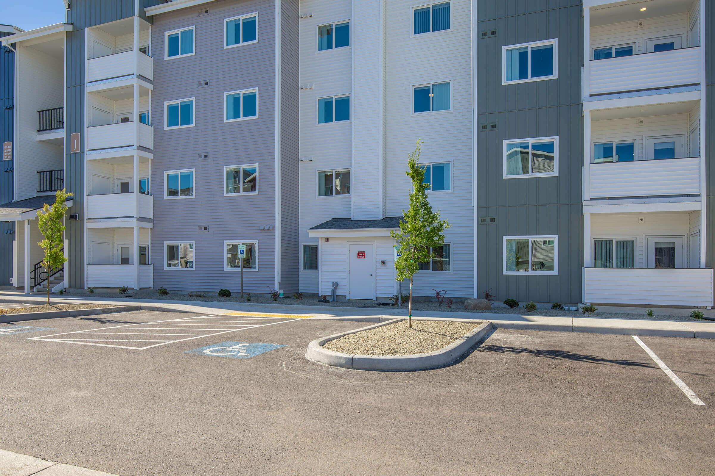 an empty road in front of a building