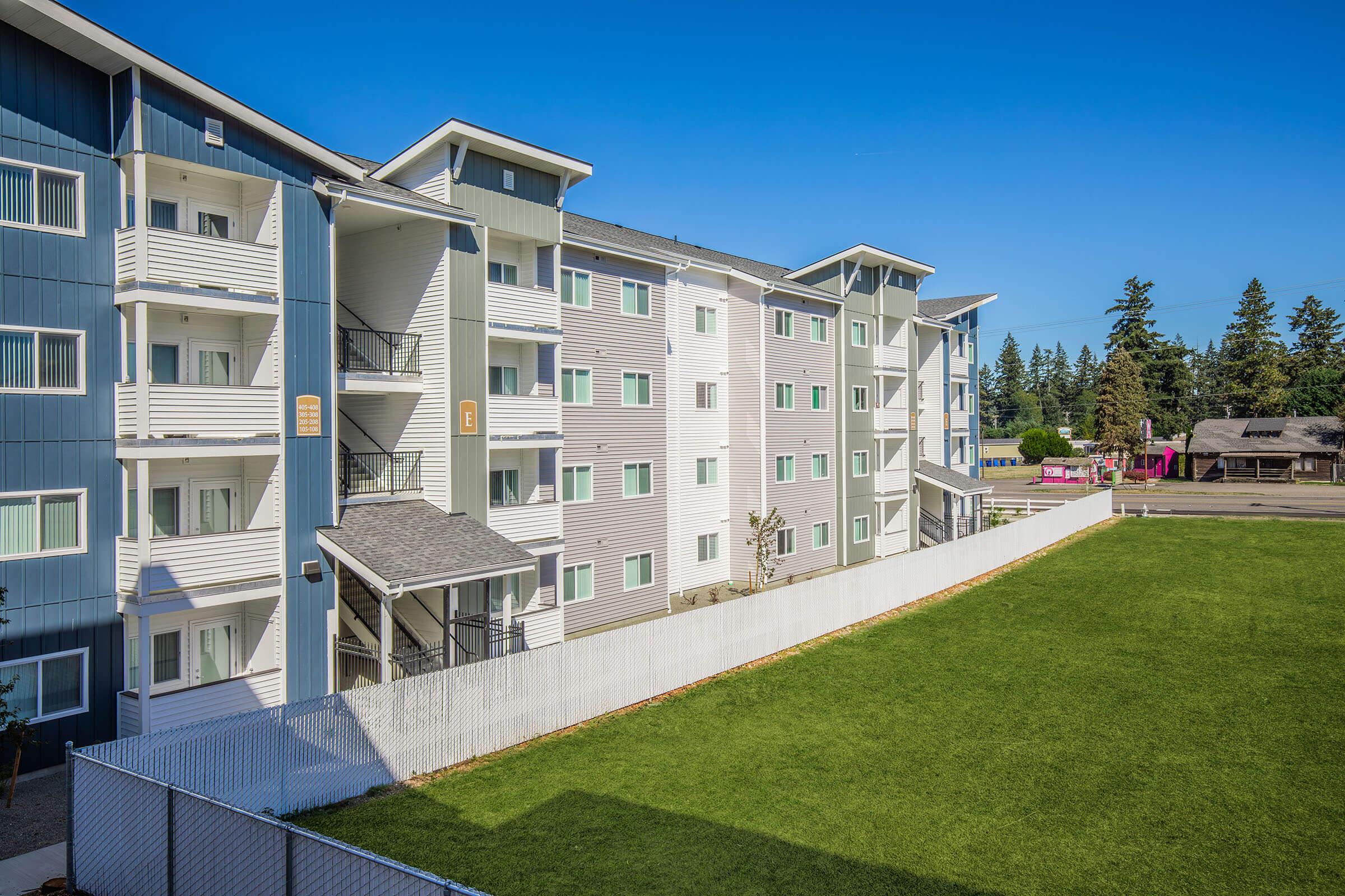 a large lawn in front of a building