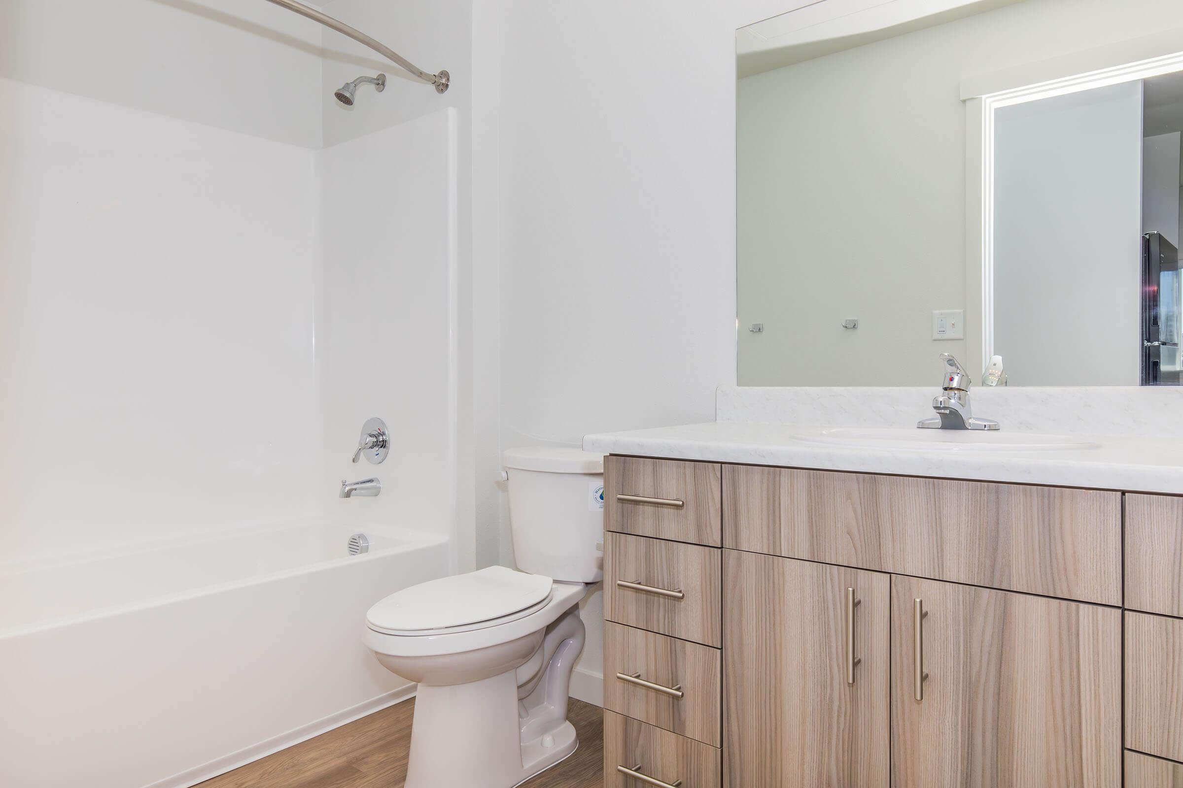 a room with a sink and a shower