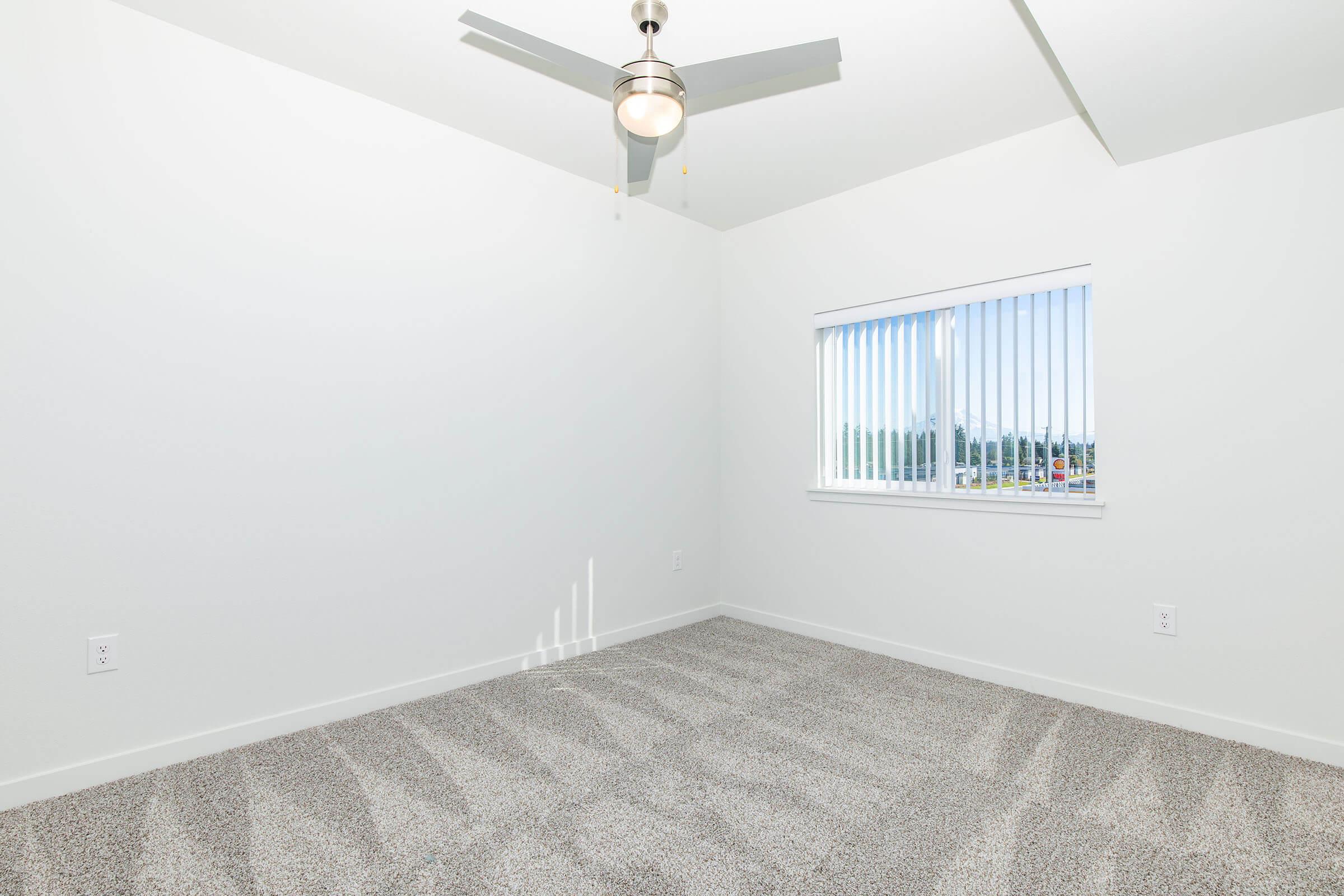 a bedroom with a large mirror