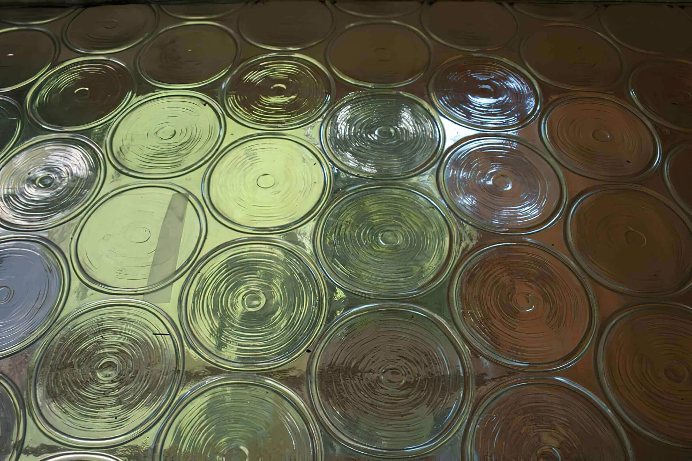 a group of empty glasses on a table
