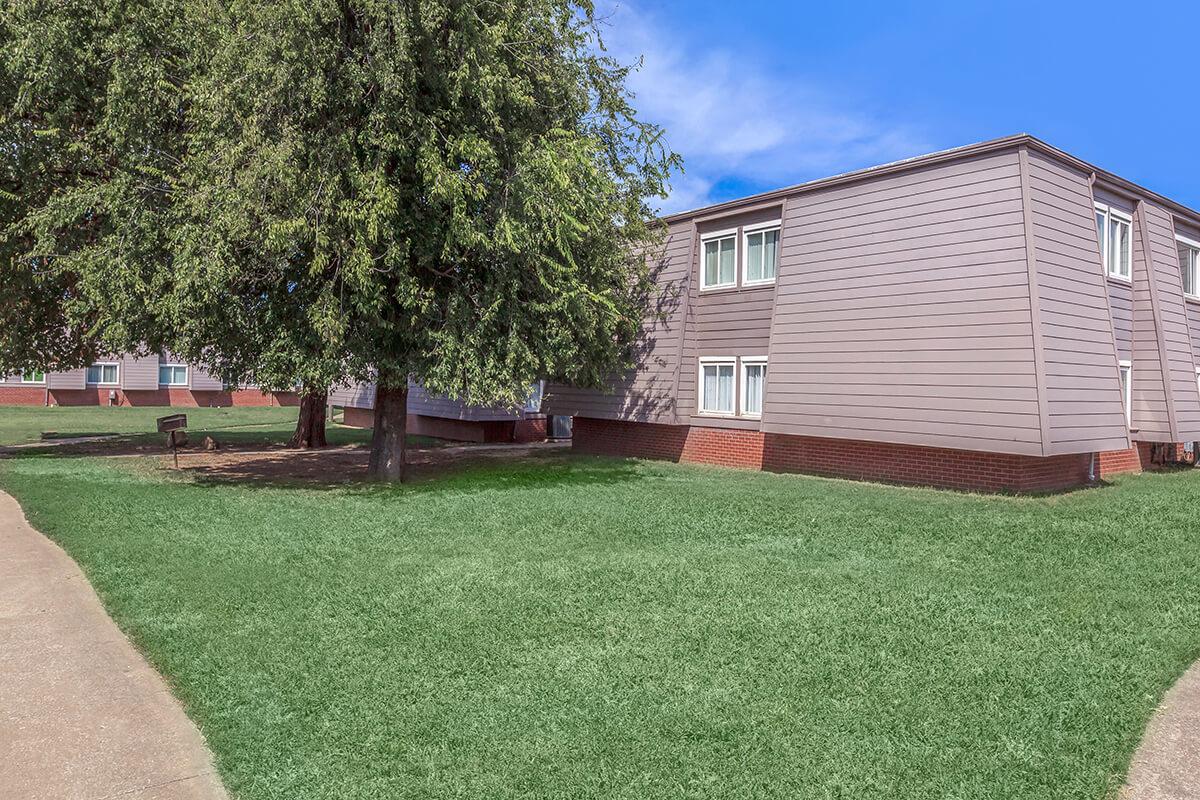 a large lawn in front of a building