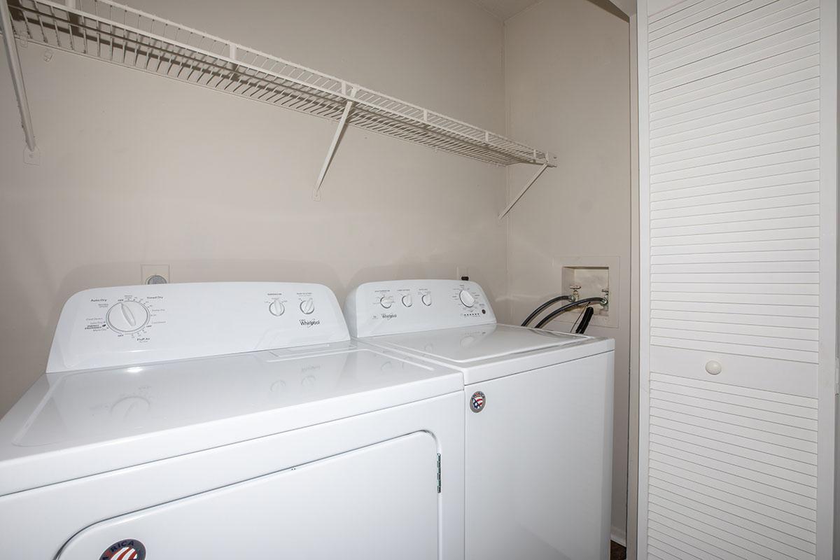 a white refrigerator freezer sitting in a room