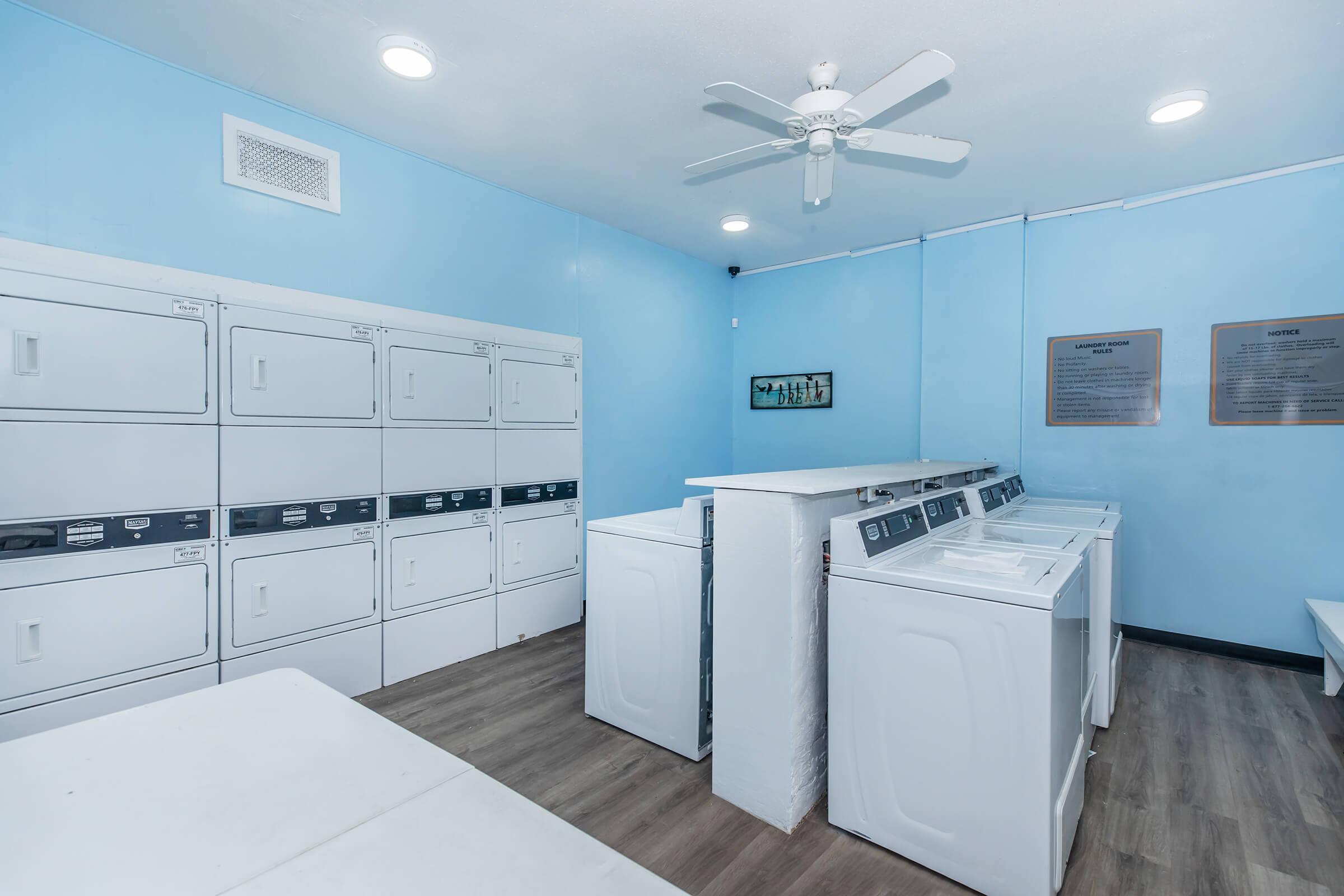 a kitchen with a blue background