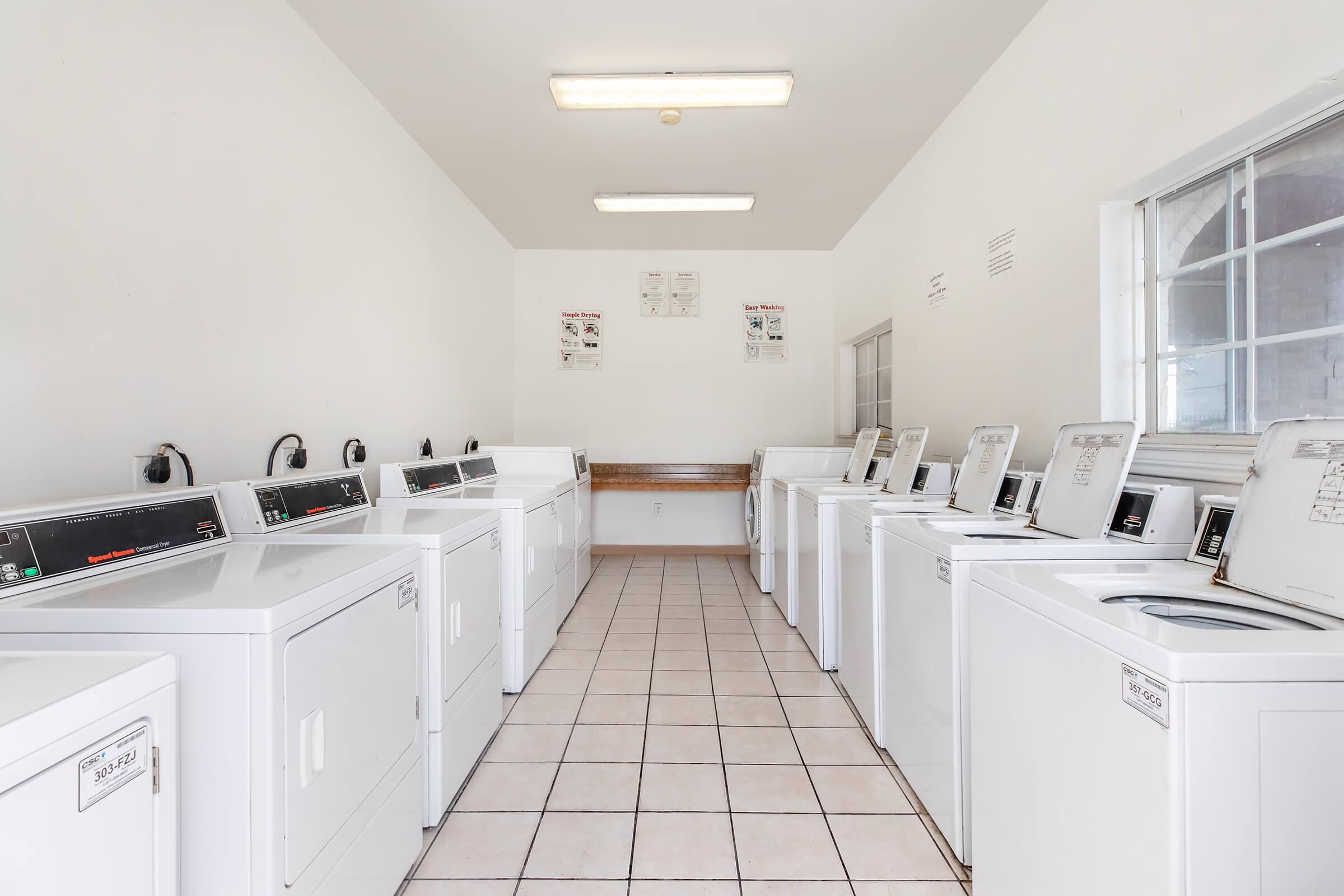 a kitchen with a tile floor