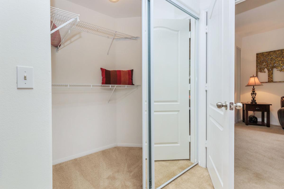 PLENTY OF CLOSET SPACE IN HENDERSON APARTMENT HOMES AT THE SUMMIT AT SUNRIDGE APARTMENTS