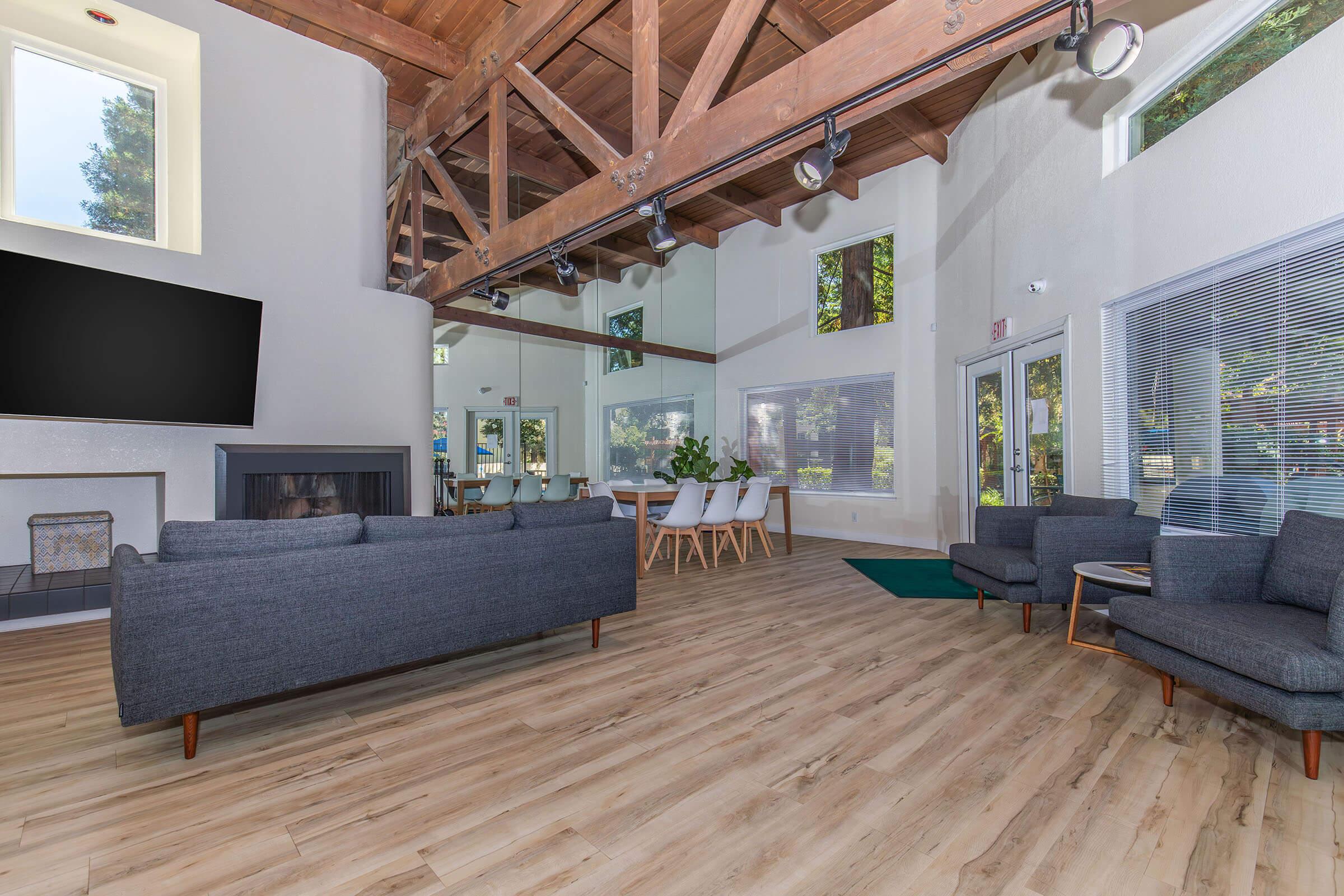 a living room with a wooden floor