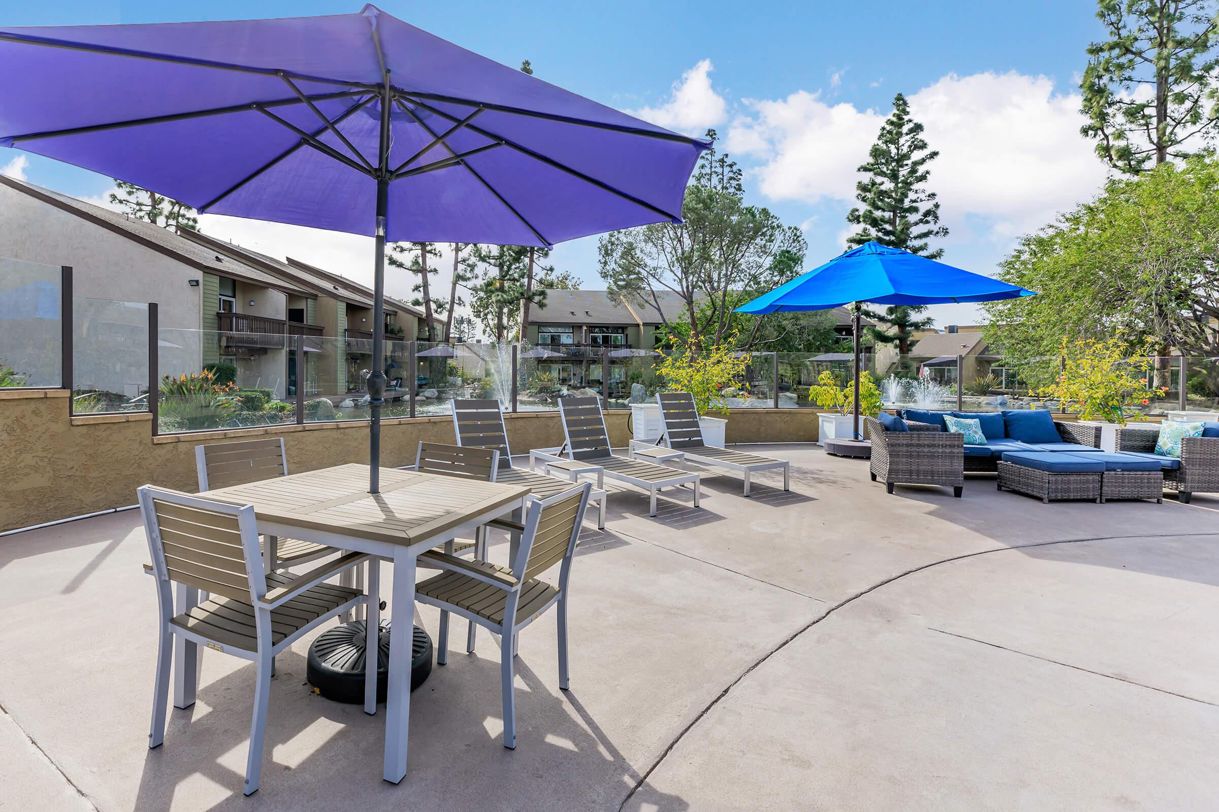 a group of lawn chairs sitting on top of a table