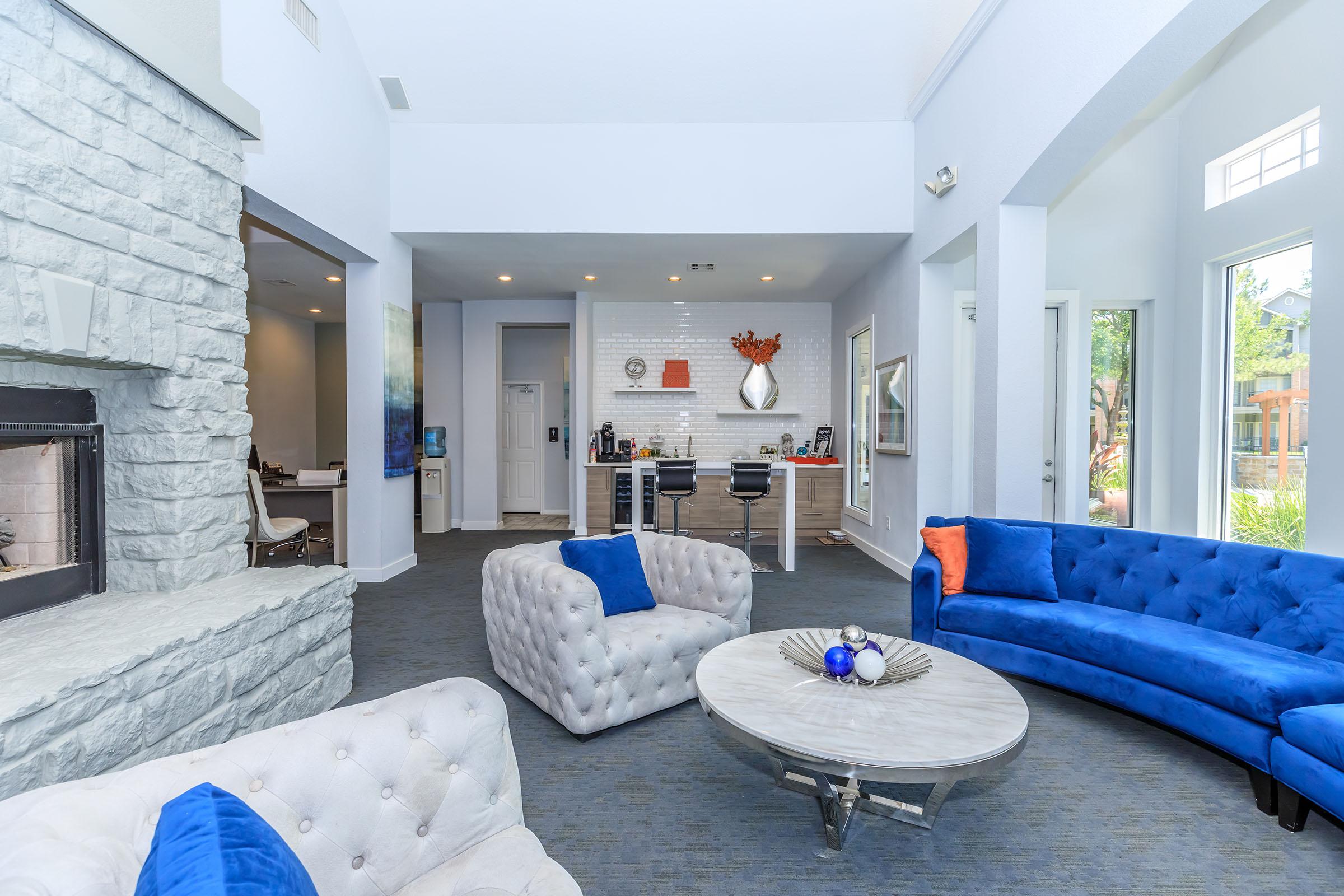 community room with a blue couch