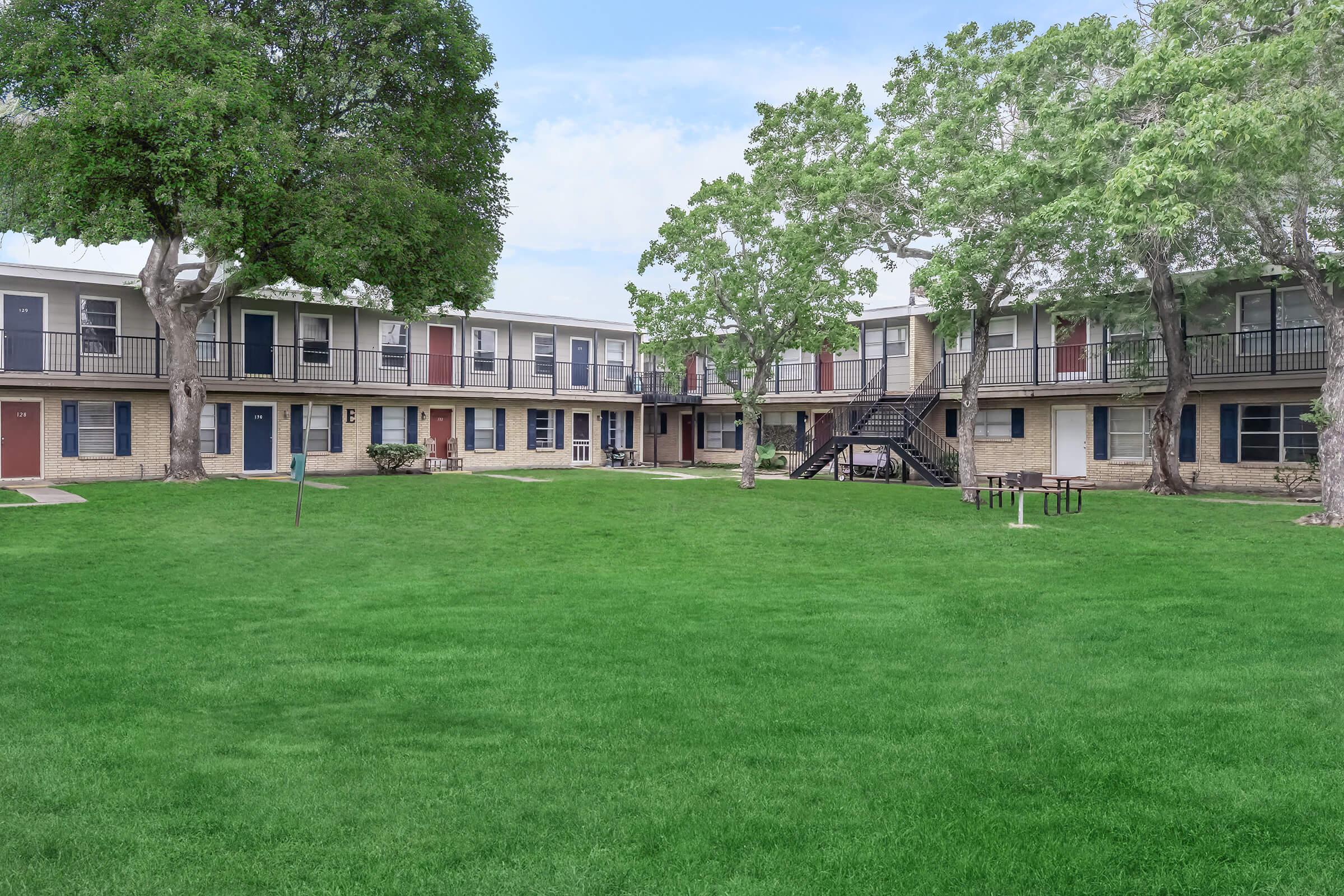 a large lawn in front of a house