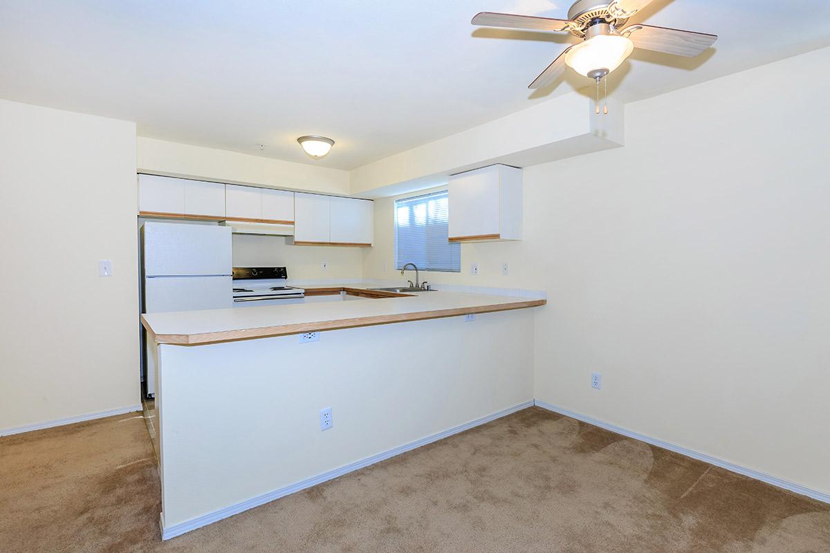 a large white refrigerator in a kitchen