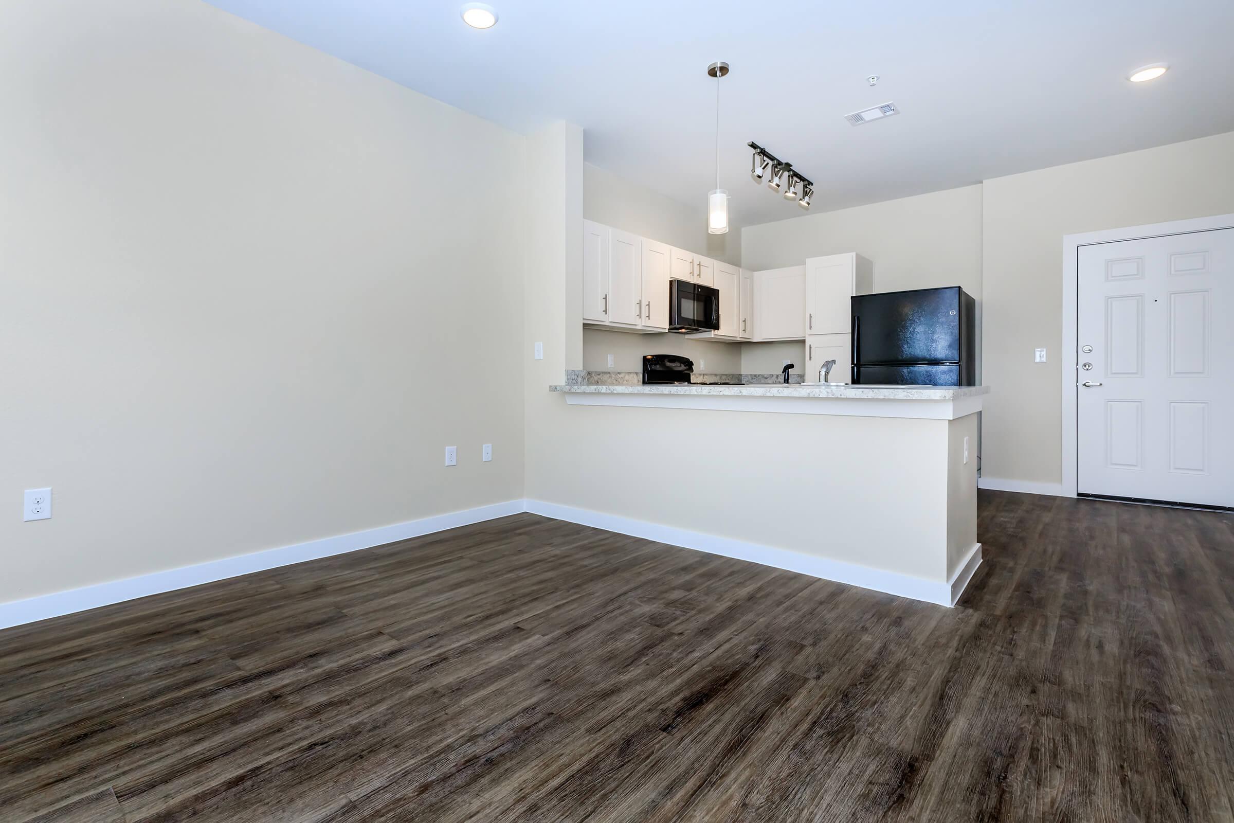 Apartments for Rent in Leander TX - Hills at Leander Spacious Kitchen with Plenty of Counterspace, Fully Equipped with Black Appliances, and Much More