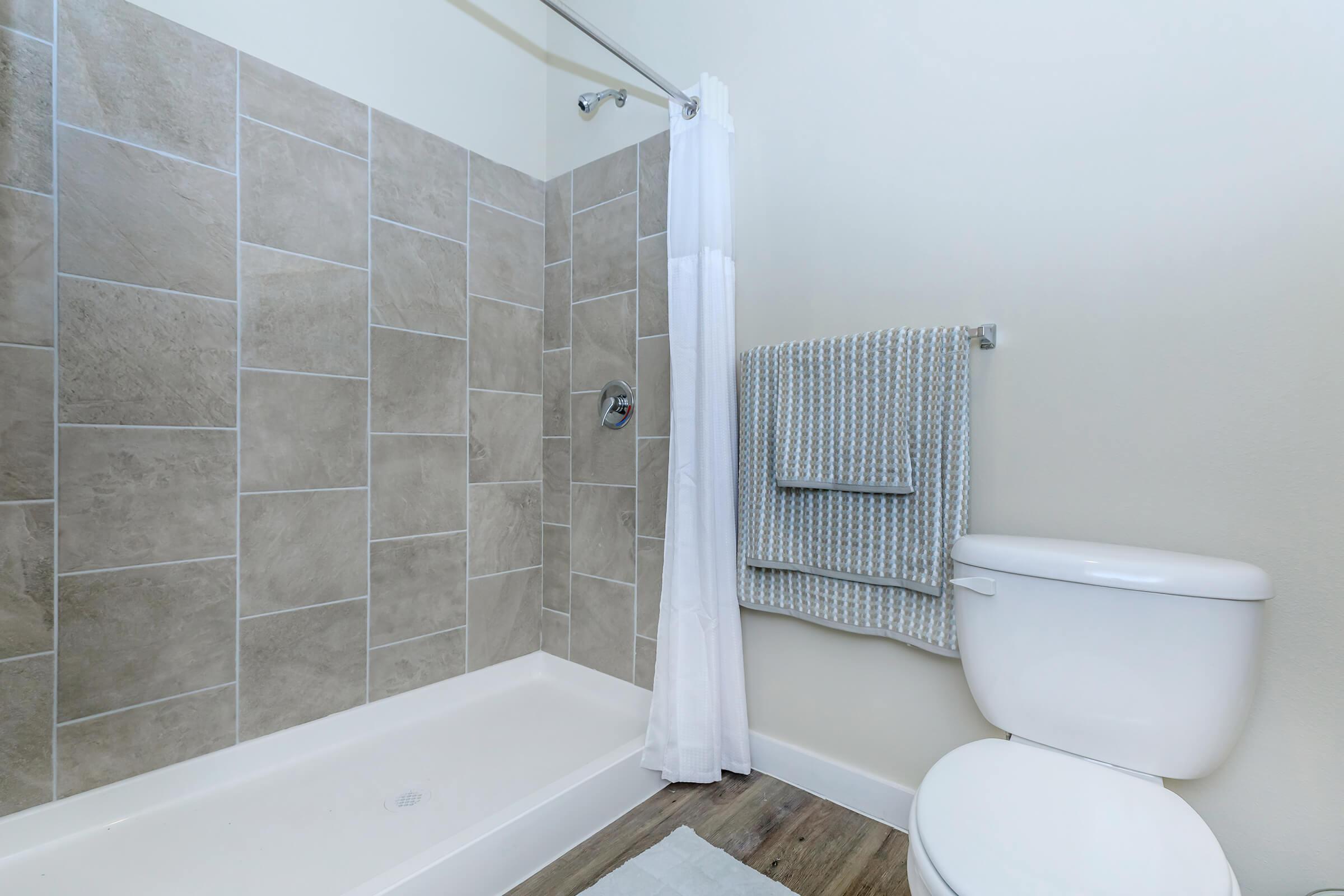 a room with a sink and a bath tub