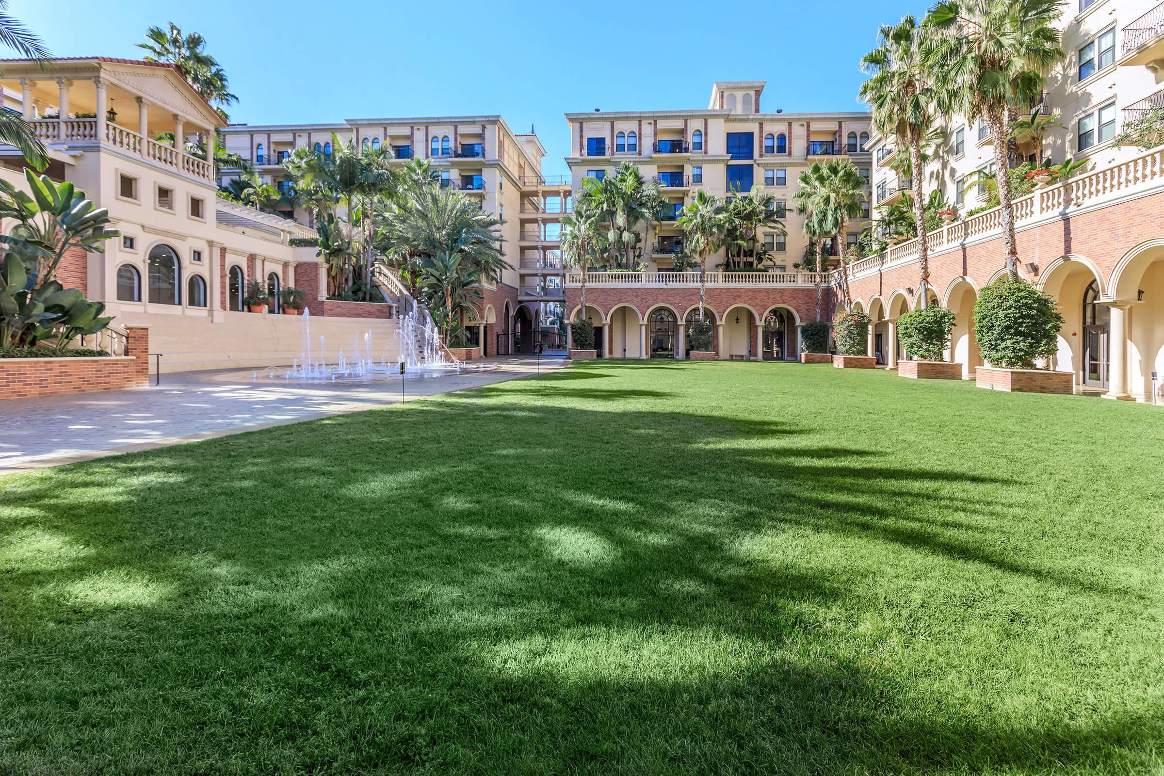 a large lawn in front of a building