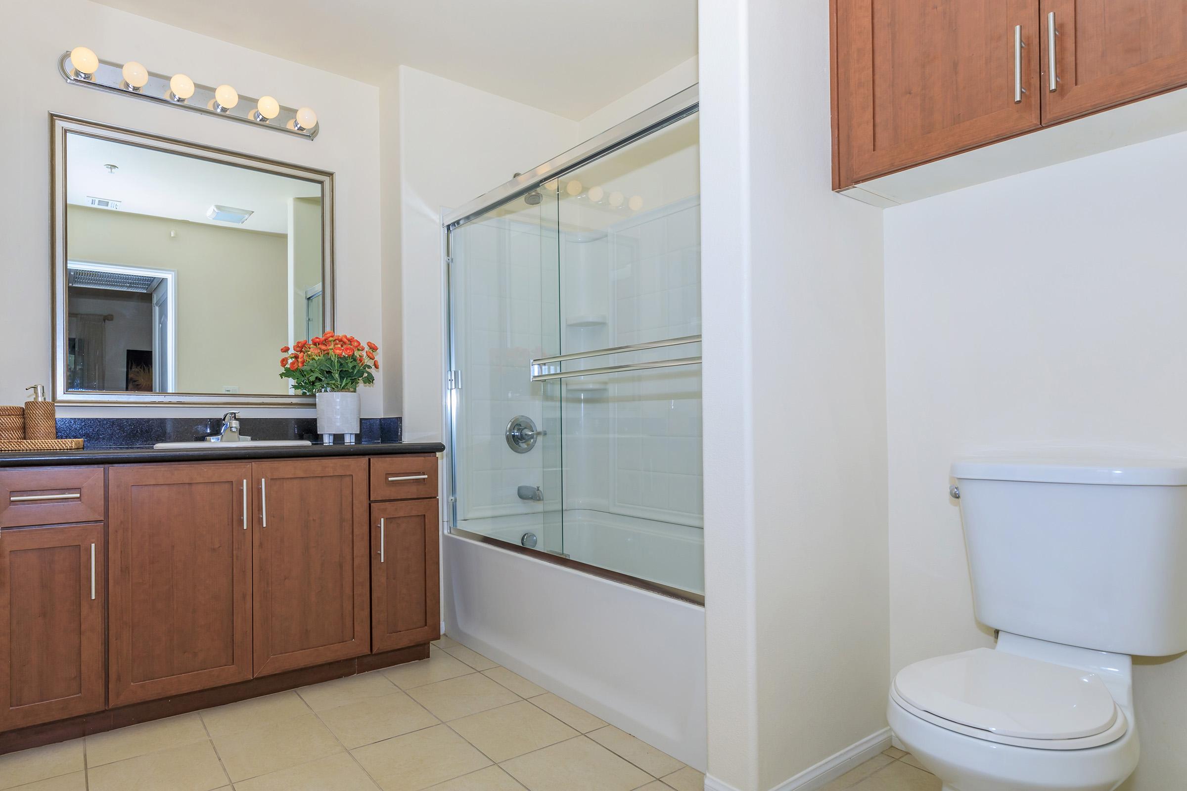 a kitchen with a sink and a refrigerator