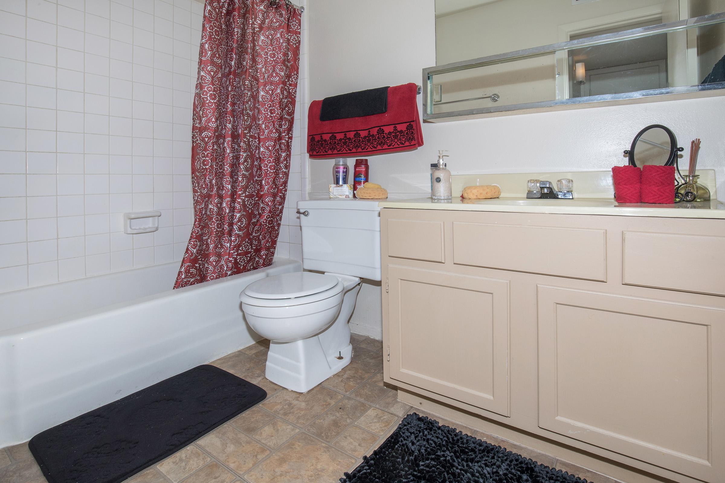 a bedroom with a shower curtain