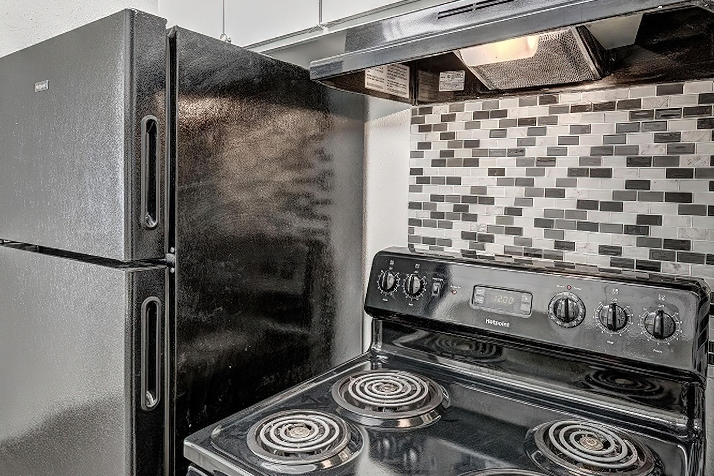 a stove top oven sitting inside of a building