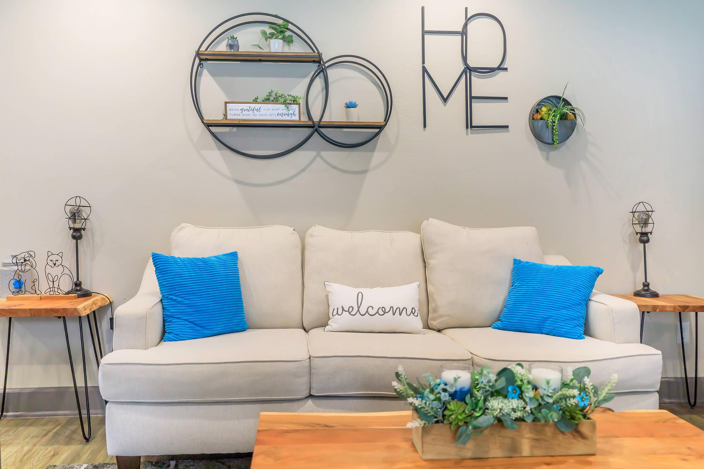 a living room with blue walls