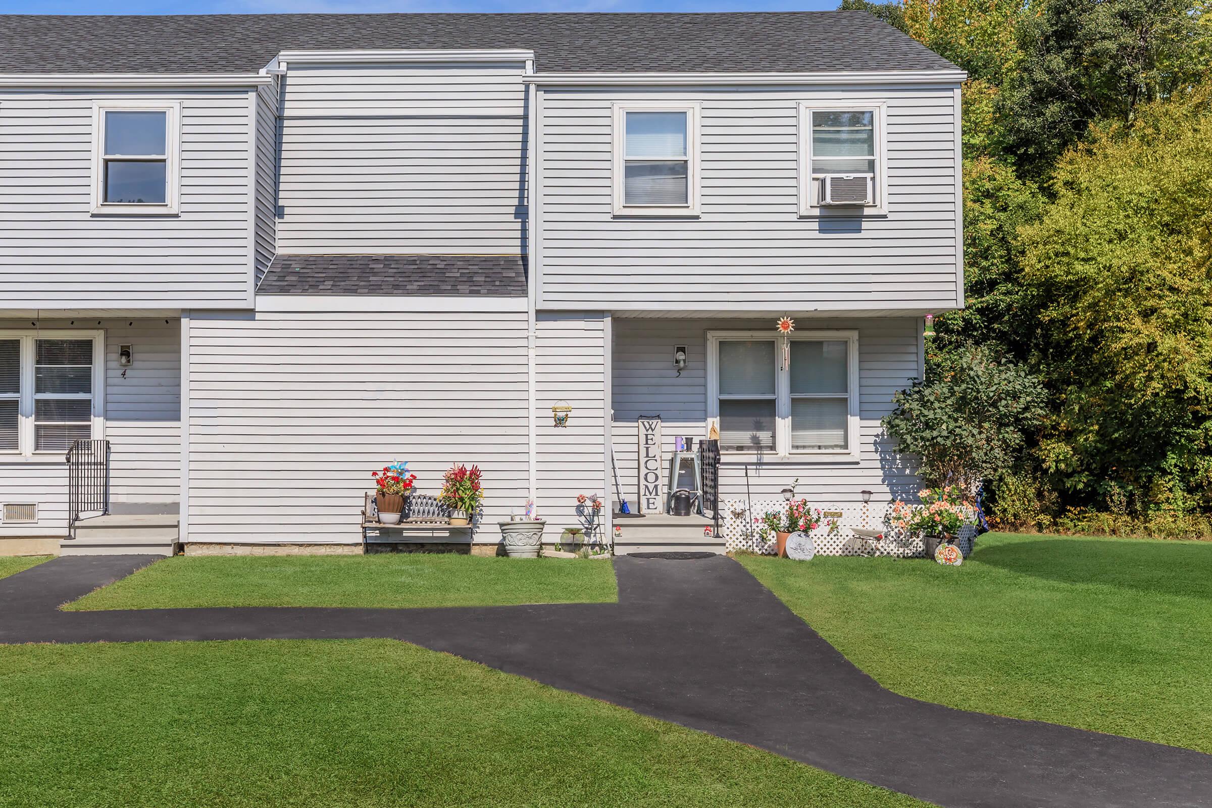 a large lawn in front of a house