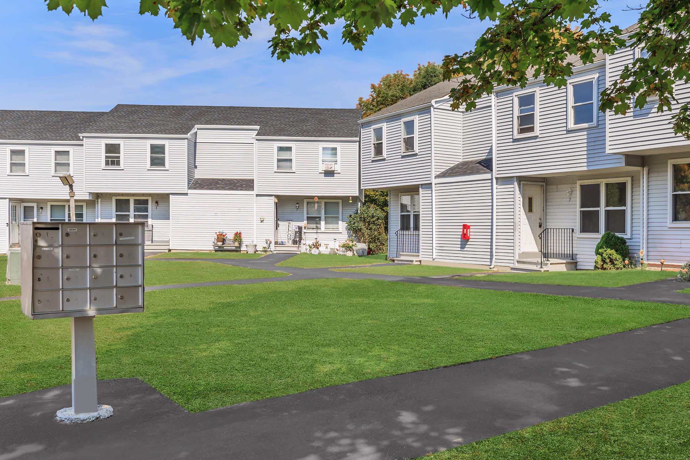 a large lawn in front of a house