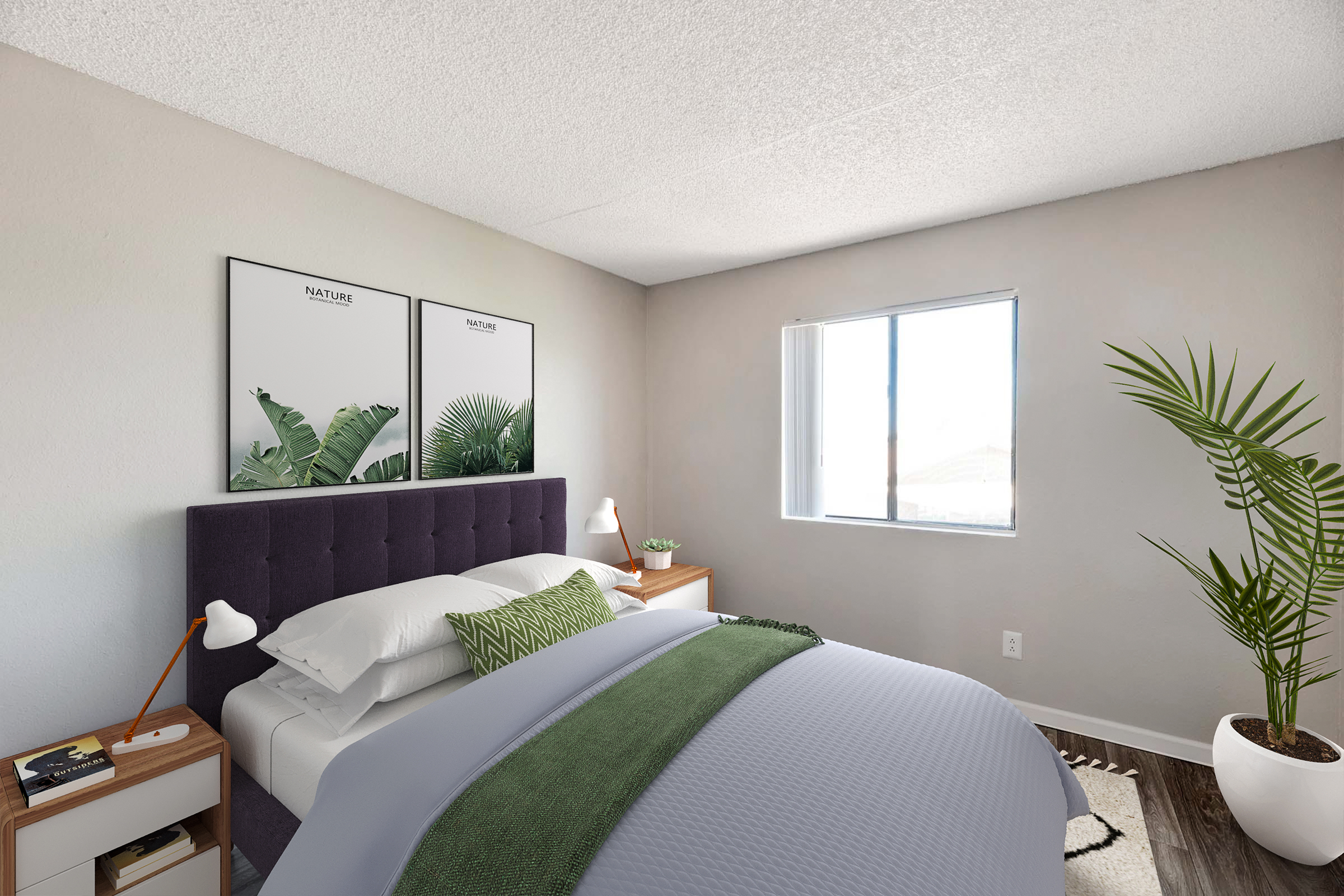 A cozy bedroom featuring a large bed with a purple headboard, green bedding, and decorative pillows. Two framed nature-themed posters adorn the wall, and a window allows natural light to fill the room. A tall potted plant adds a touch of greenery, while a bedside table holds a lamp and small items.