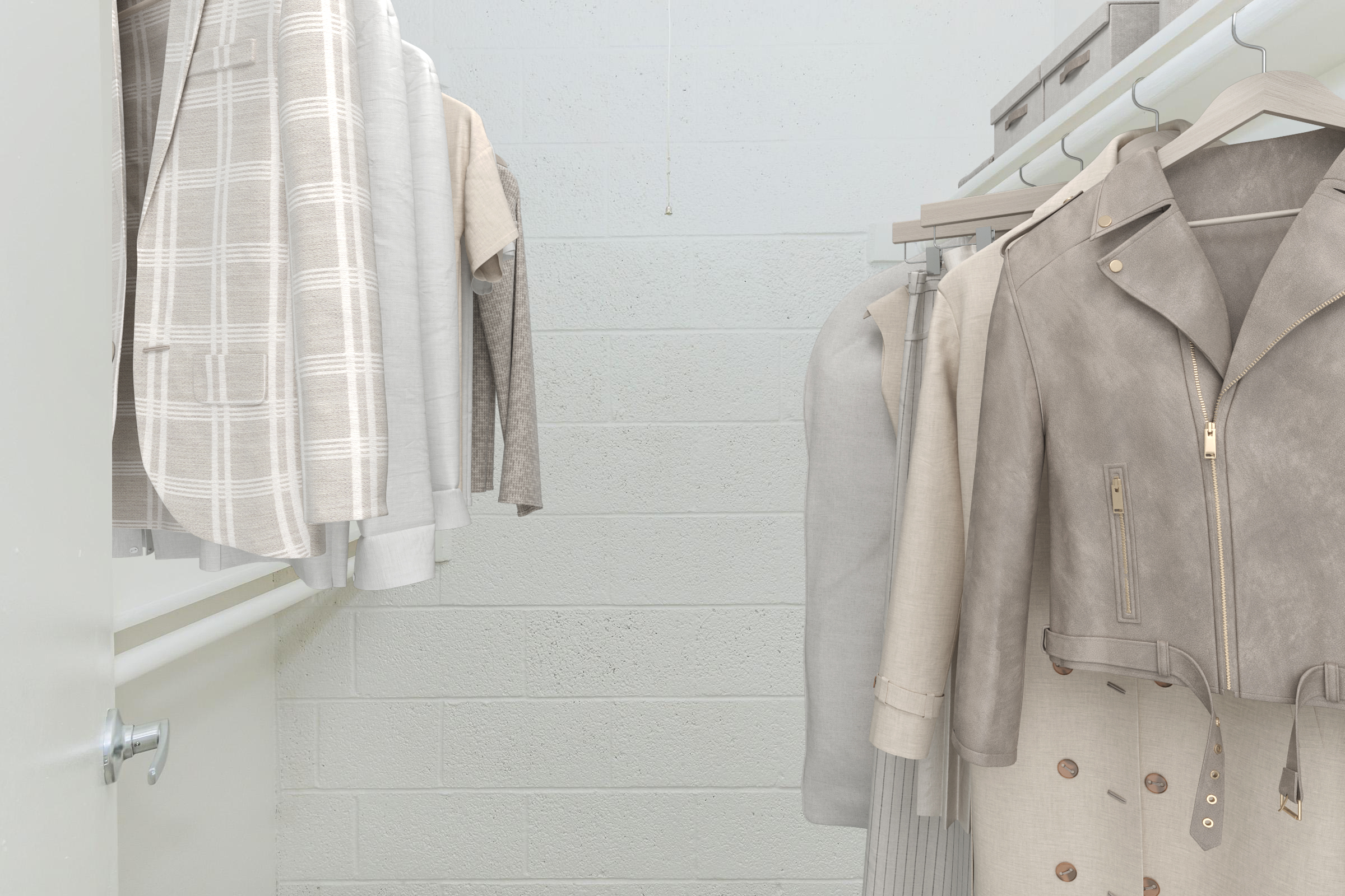 A neatly organized closet featuring a variety of light-colored clothing items, including a leather jacket, blouses, and trousers, hanging on wooden hangers against a plain, light gray wall. The closet has a clean and minimalist aesthetic, with soft lighting enhancing the visual appeal.
