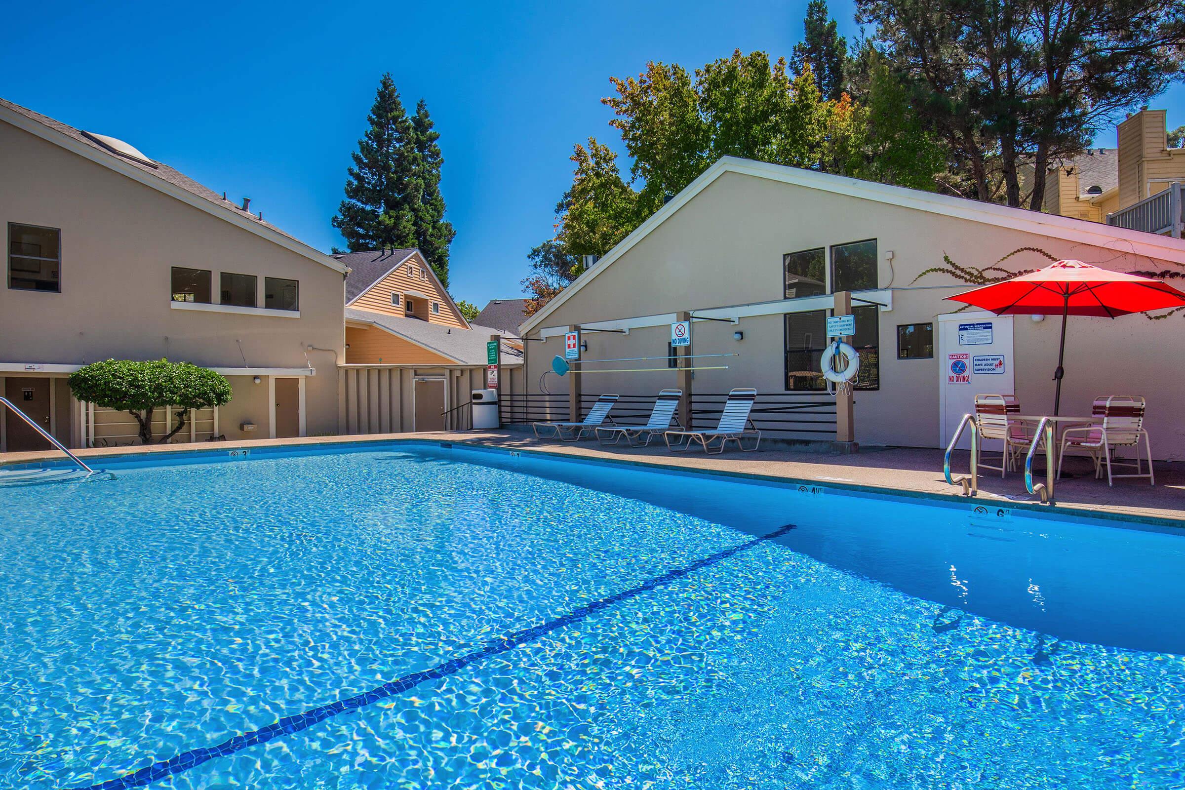 a house with a large pool of water