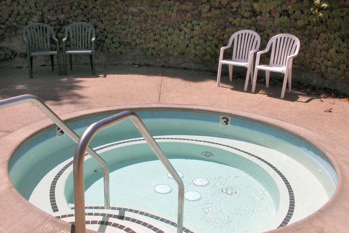 a chair sitting in front of a pool table