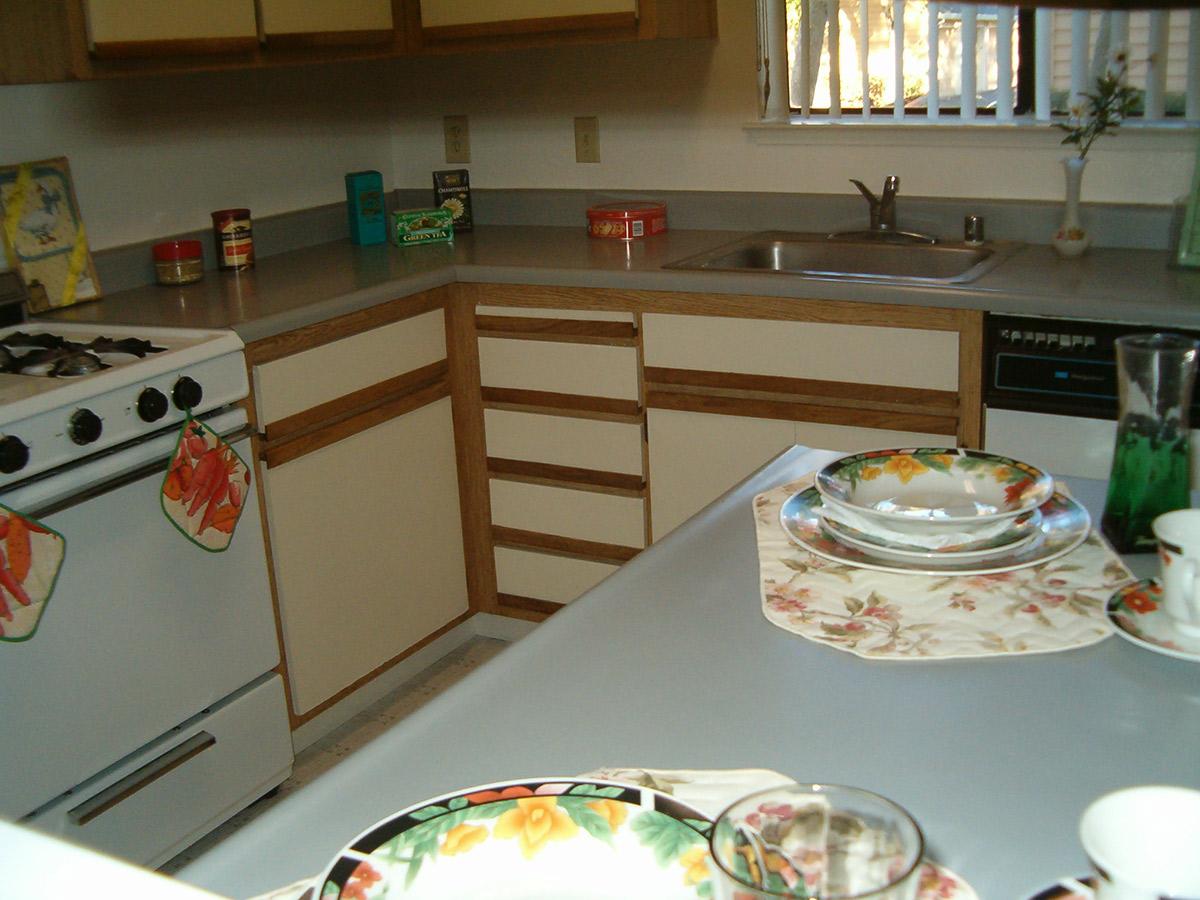 a kitchen with a plate of food on a table