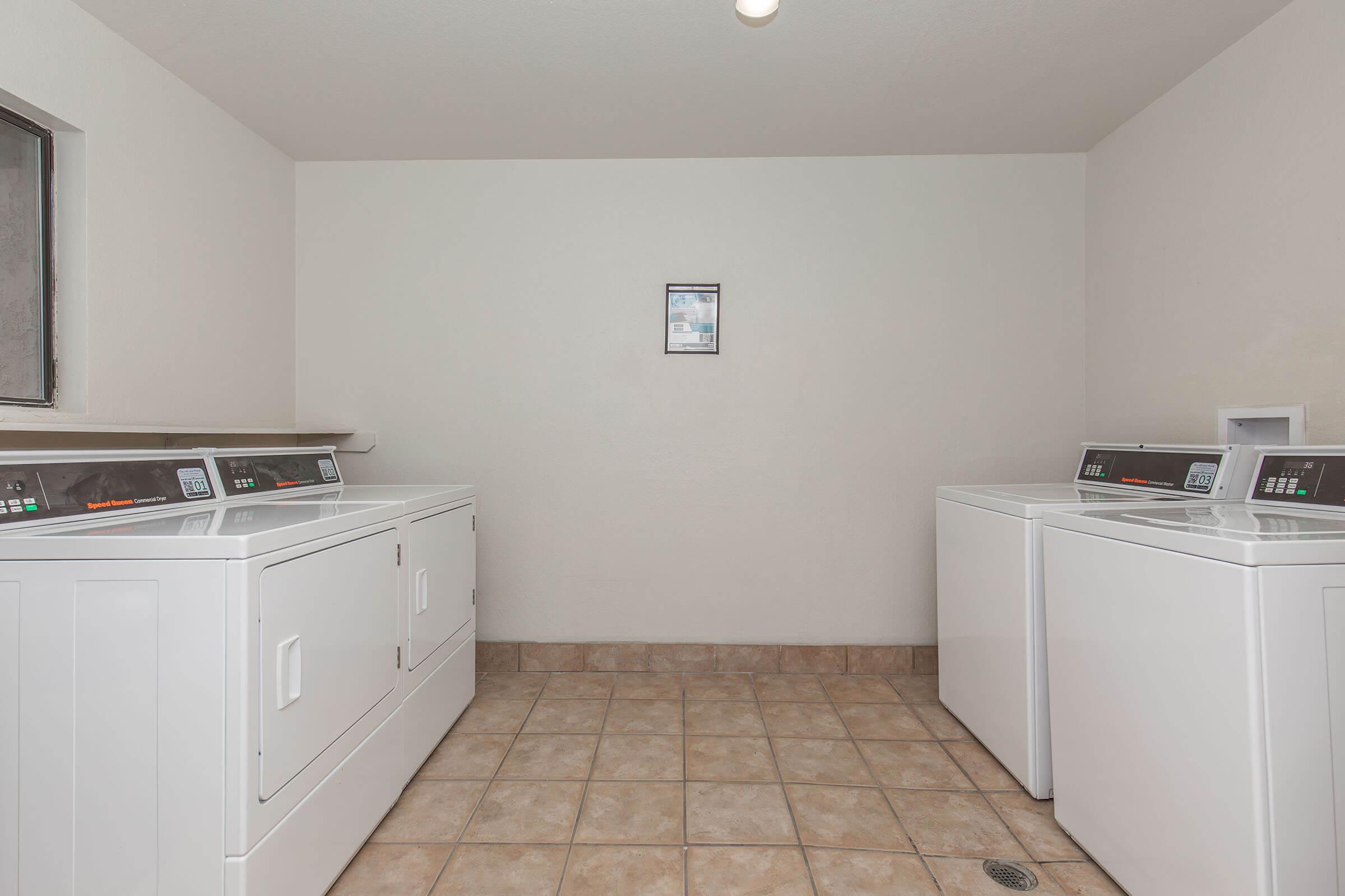 a kitchen with a stove sink and refrigerator