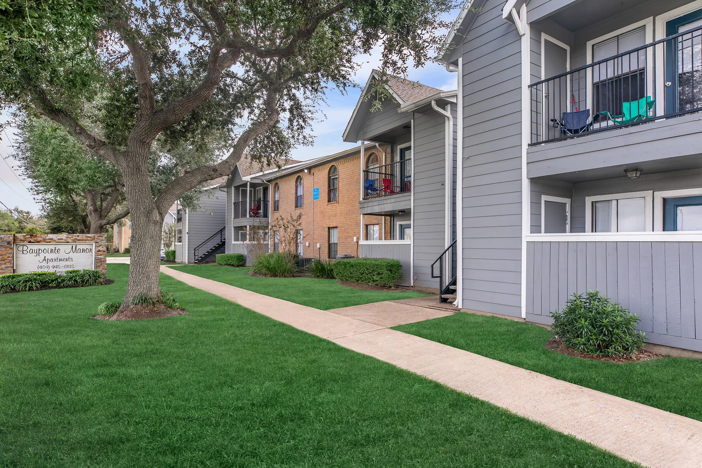 a large lawn in front of a house