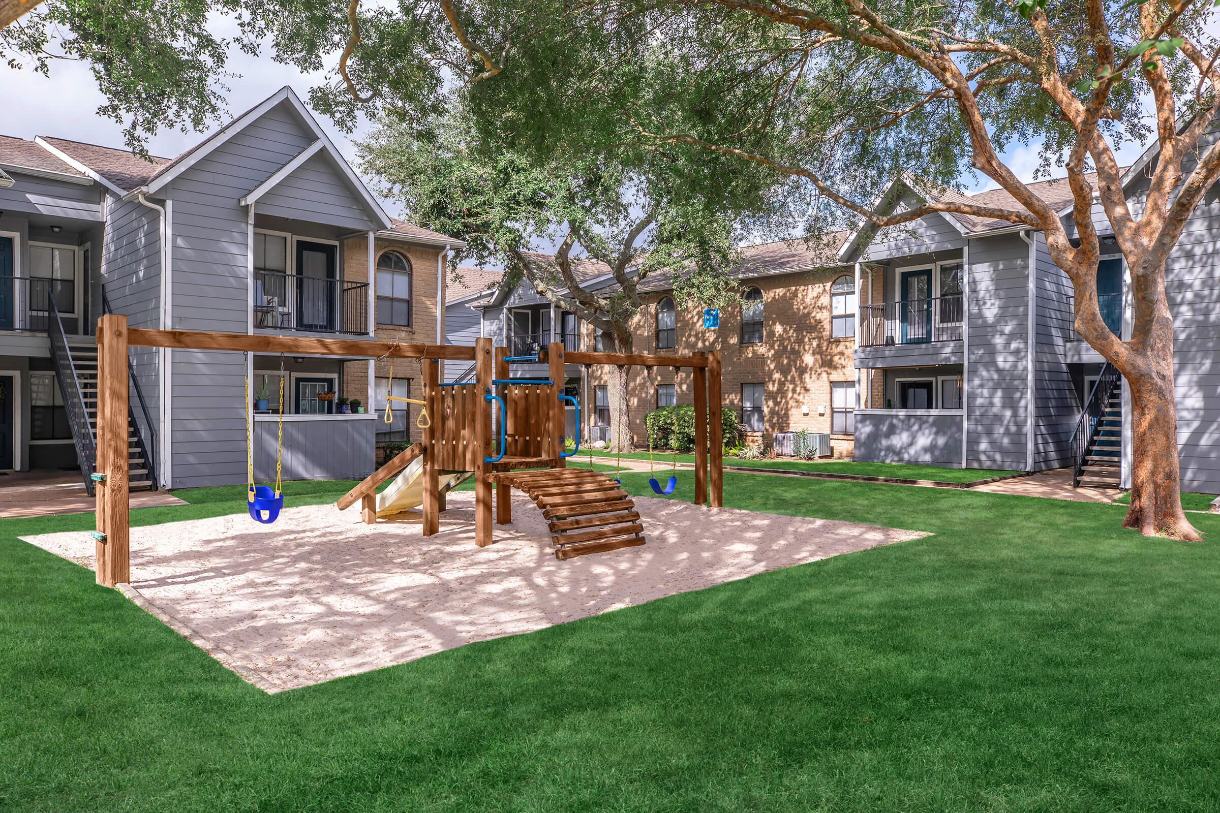 a large lawn in front of a house