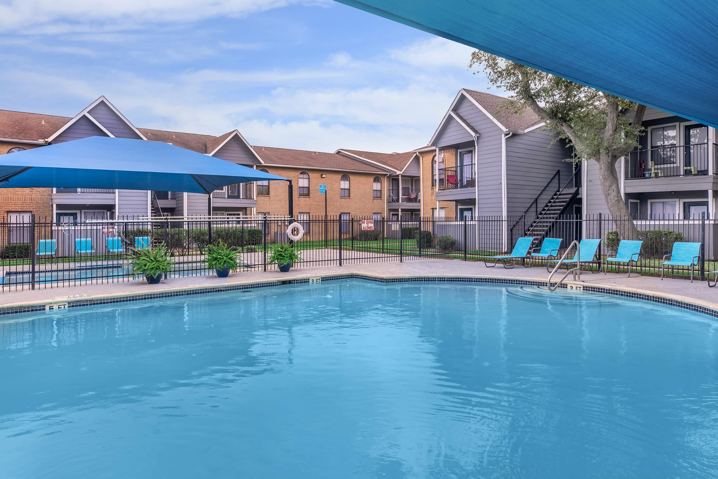 a house with a large pool of water