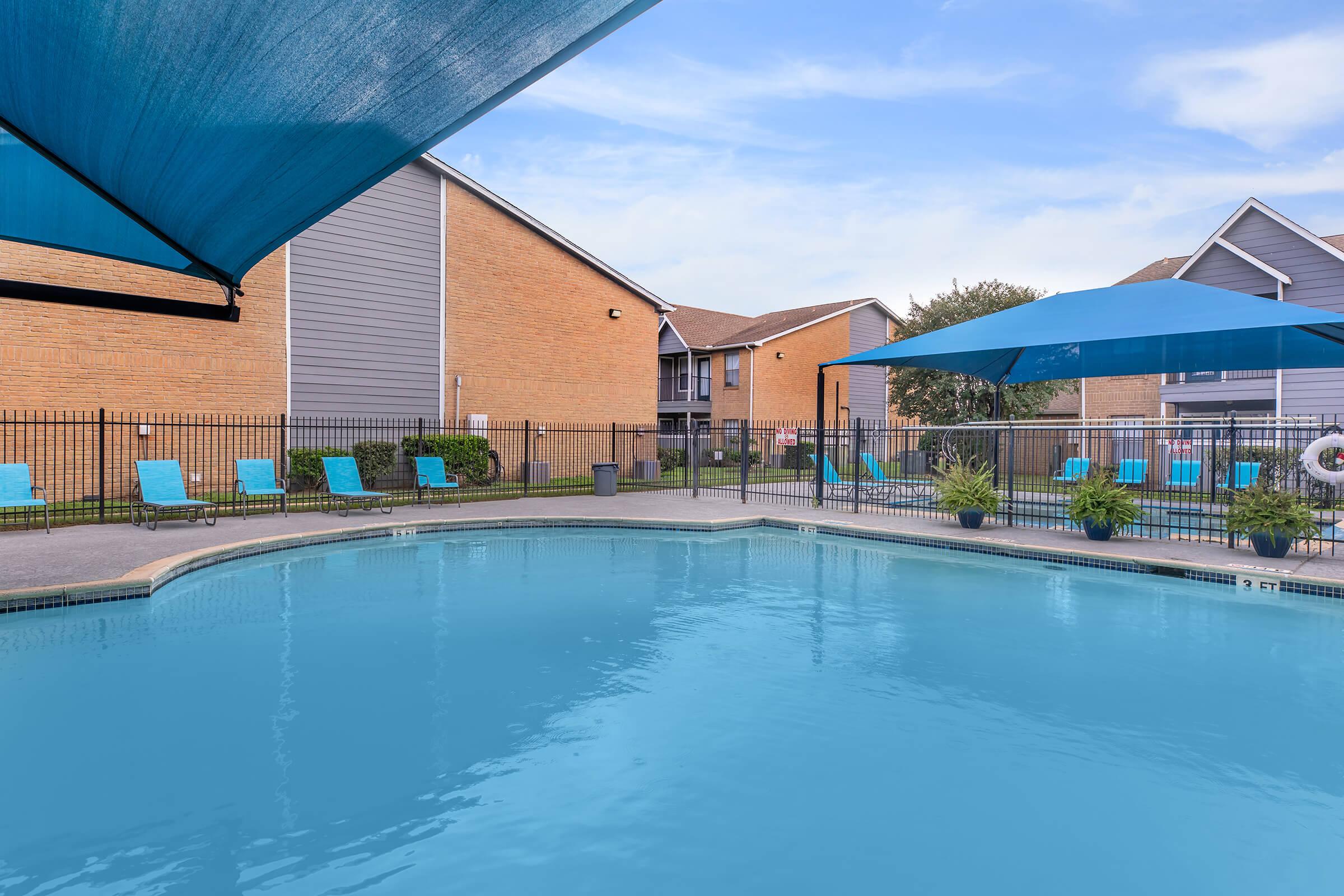 a house with a large pool of water