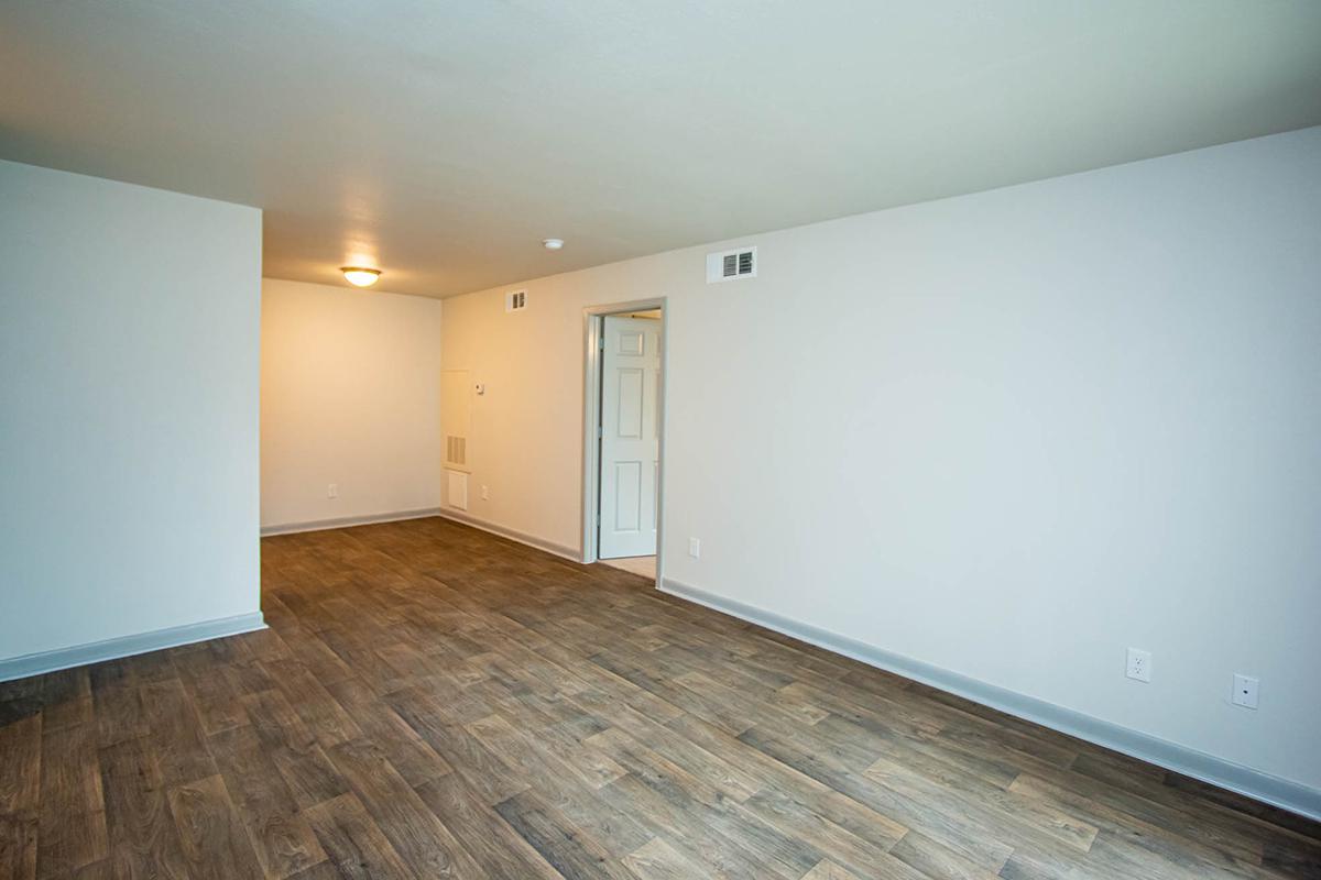 a kitchen with a wood floor