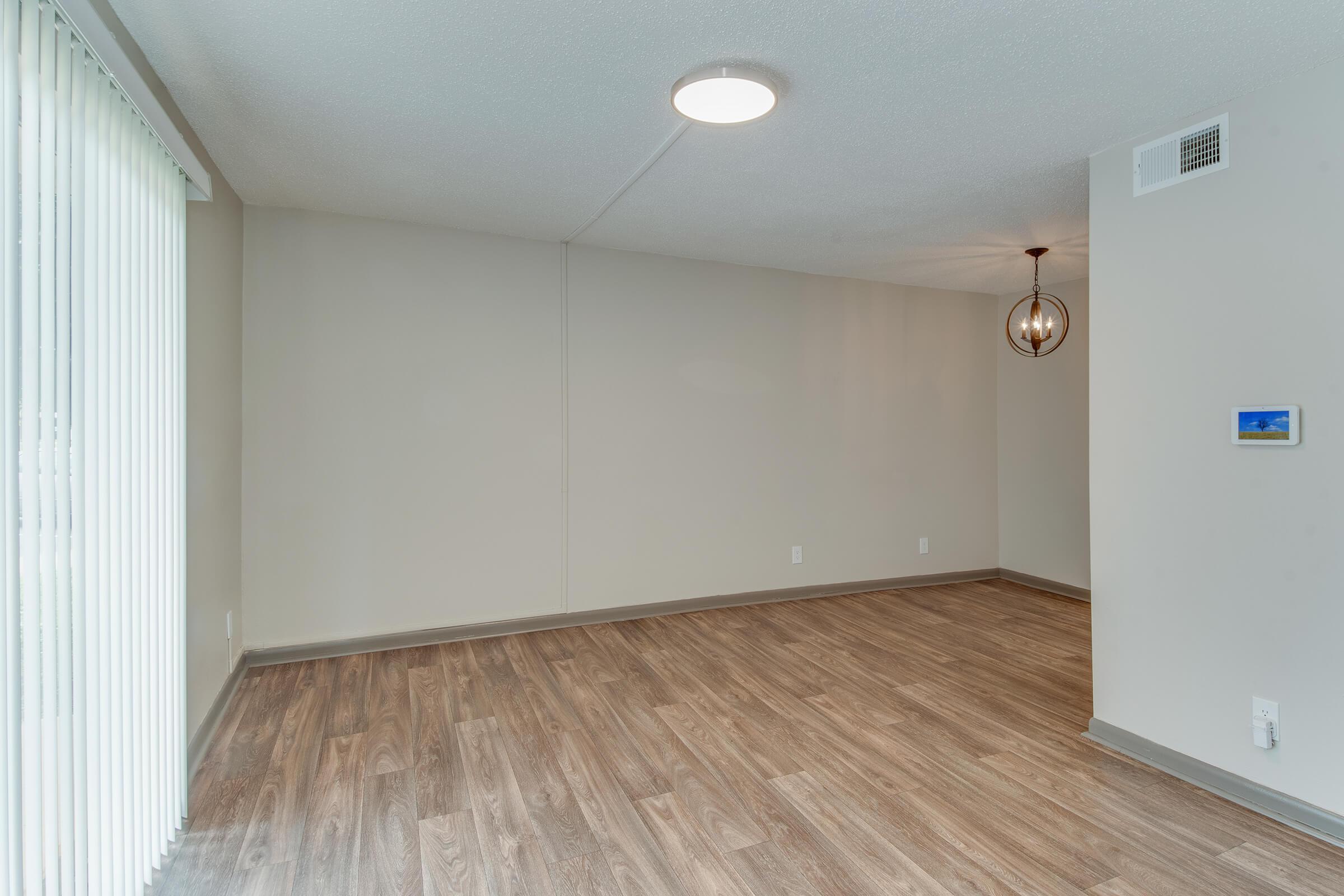 Open living area with hardwood floors