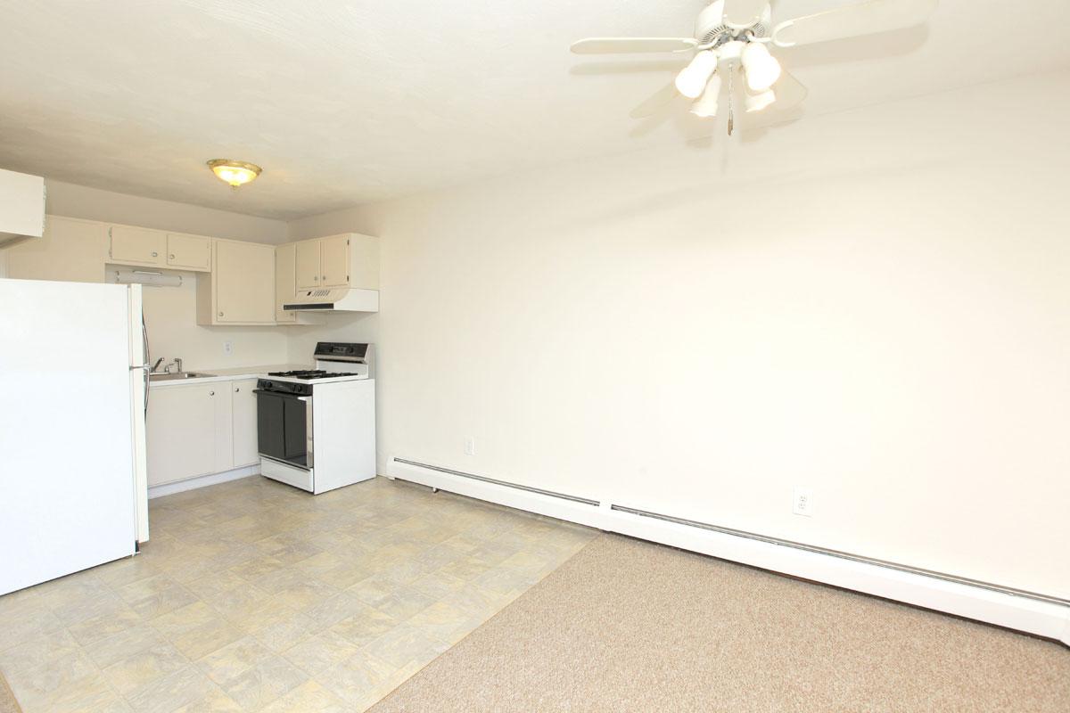 a kitchen with a wooden floor