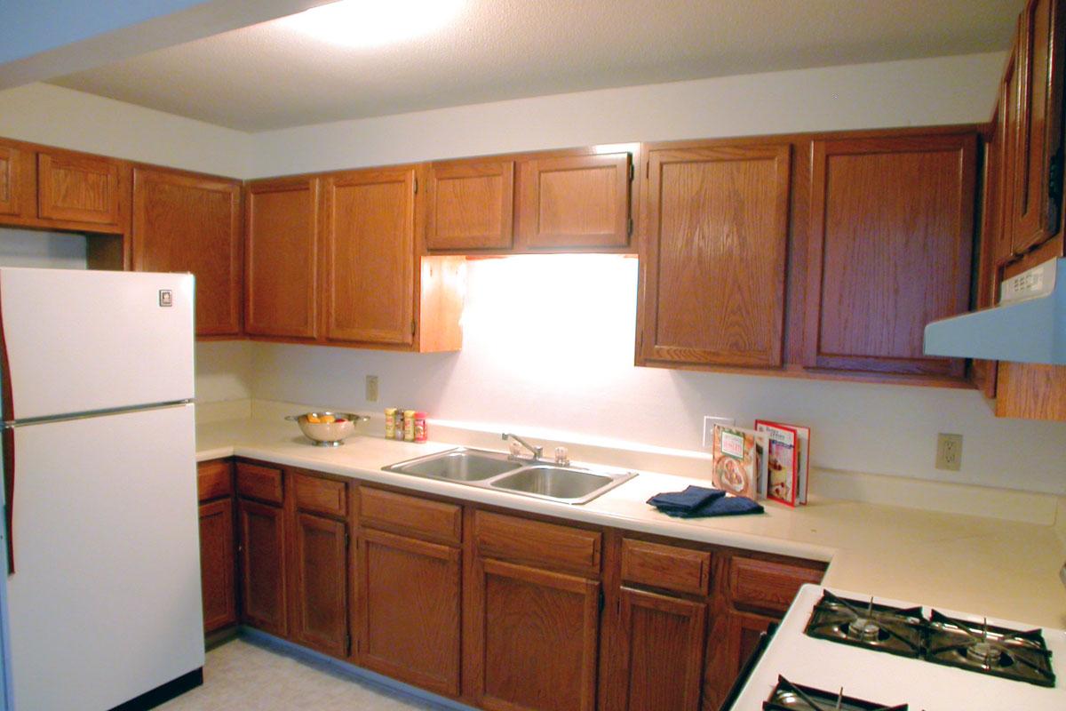 a stainless steel refrigerator in a kitchen
