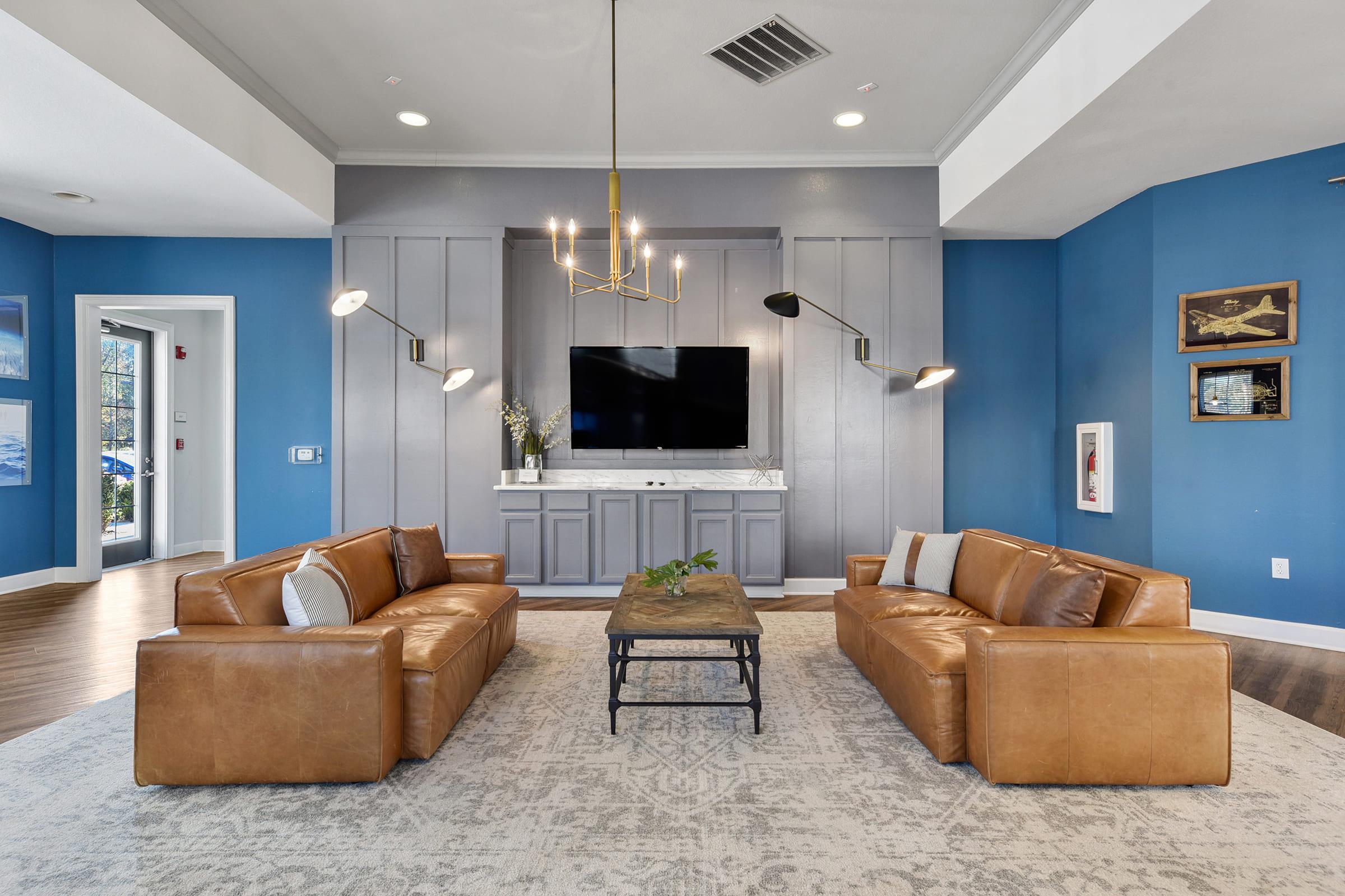 a living room filled with furniture and a fireplace