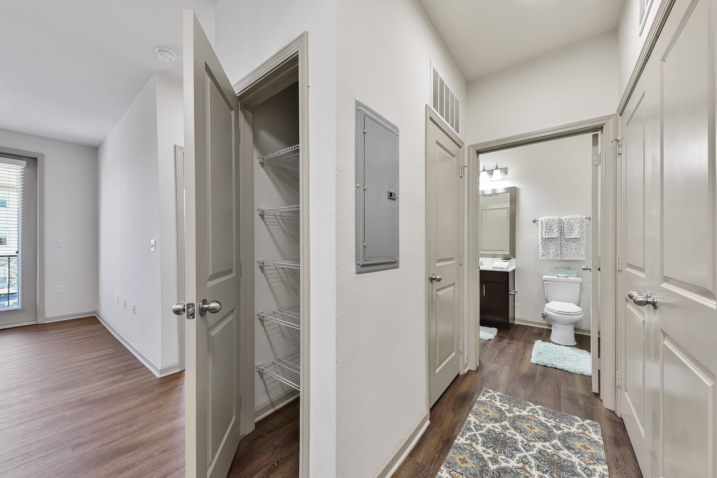 a room with a sink and a mirror