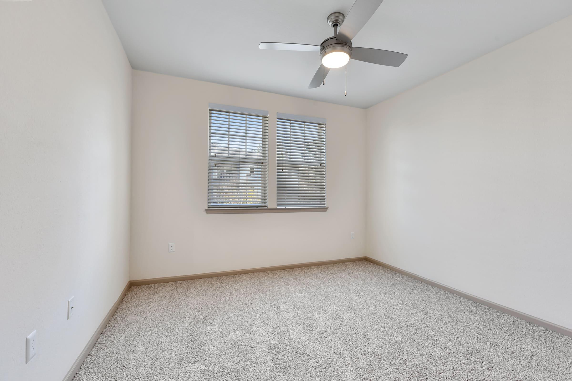 a room with a sink and a window