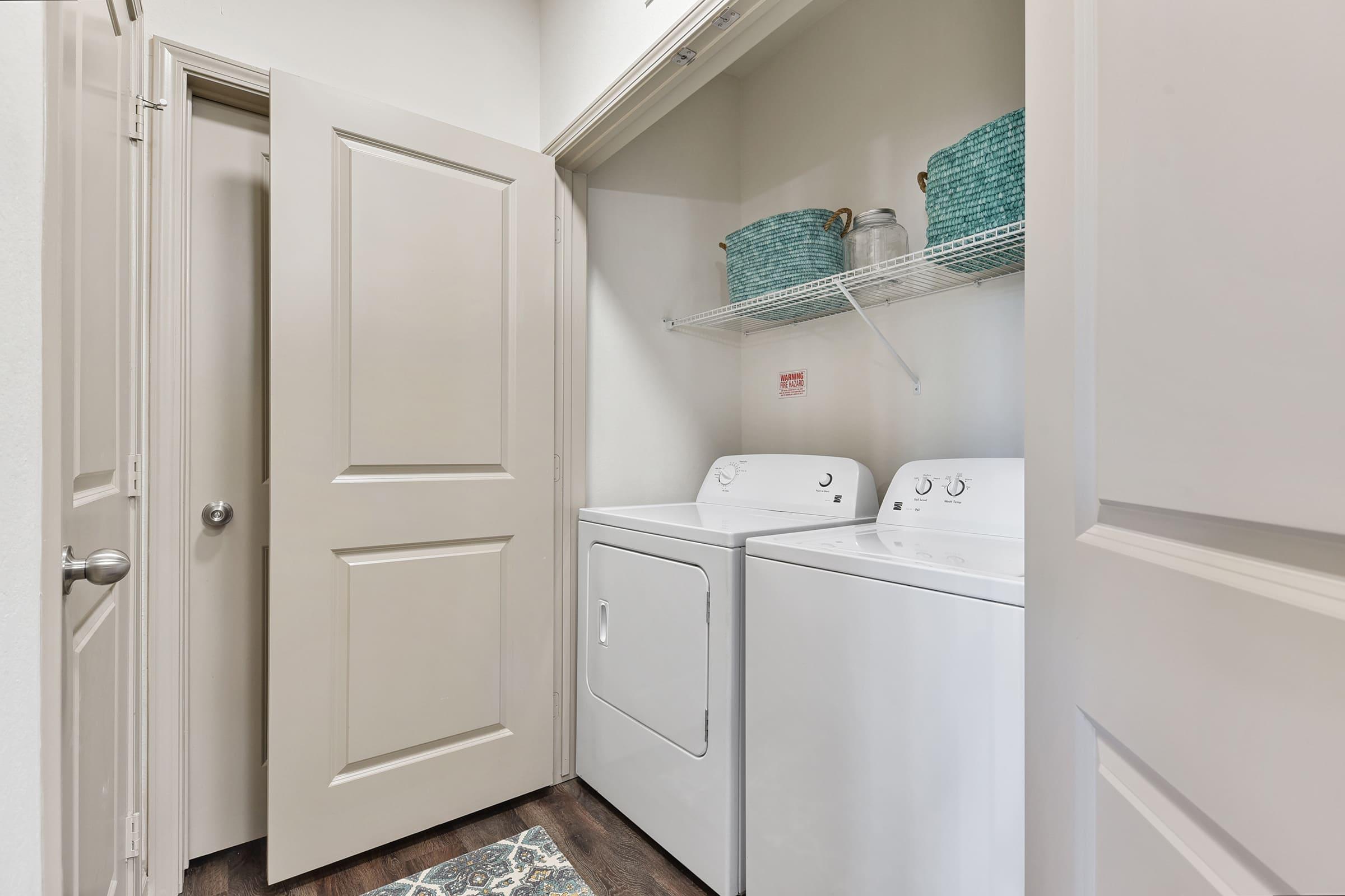 a kitchen with a sink and a refrigerator