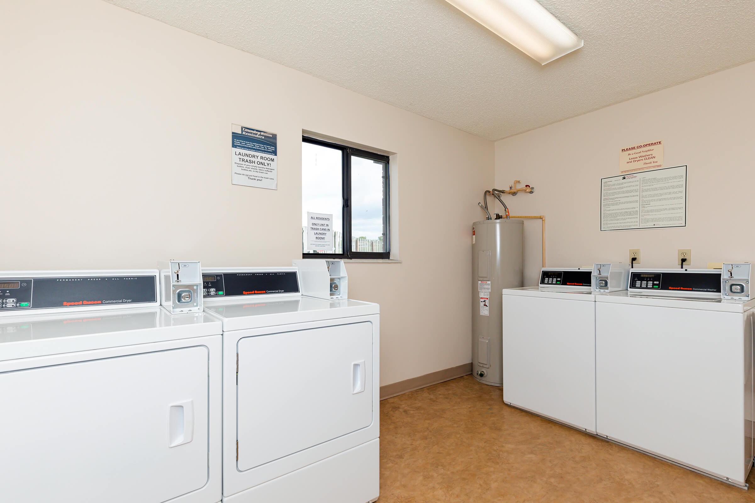 a kitchen with a stove and a refrigerator