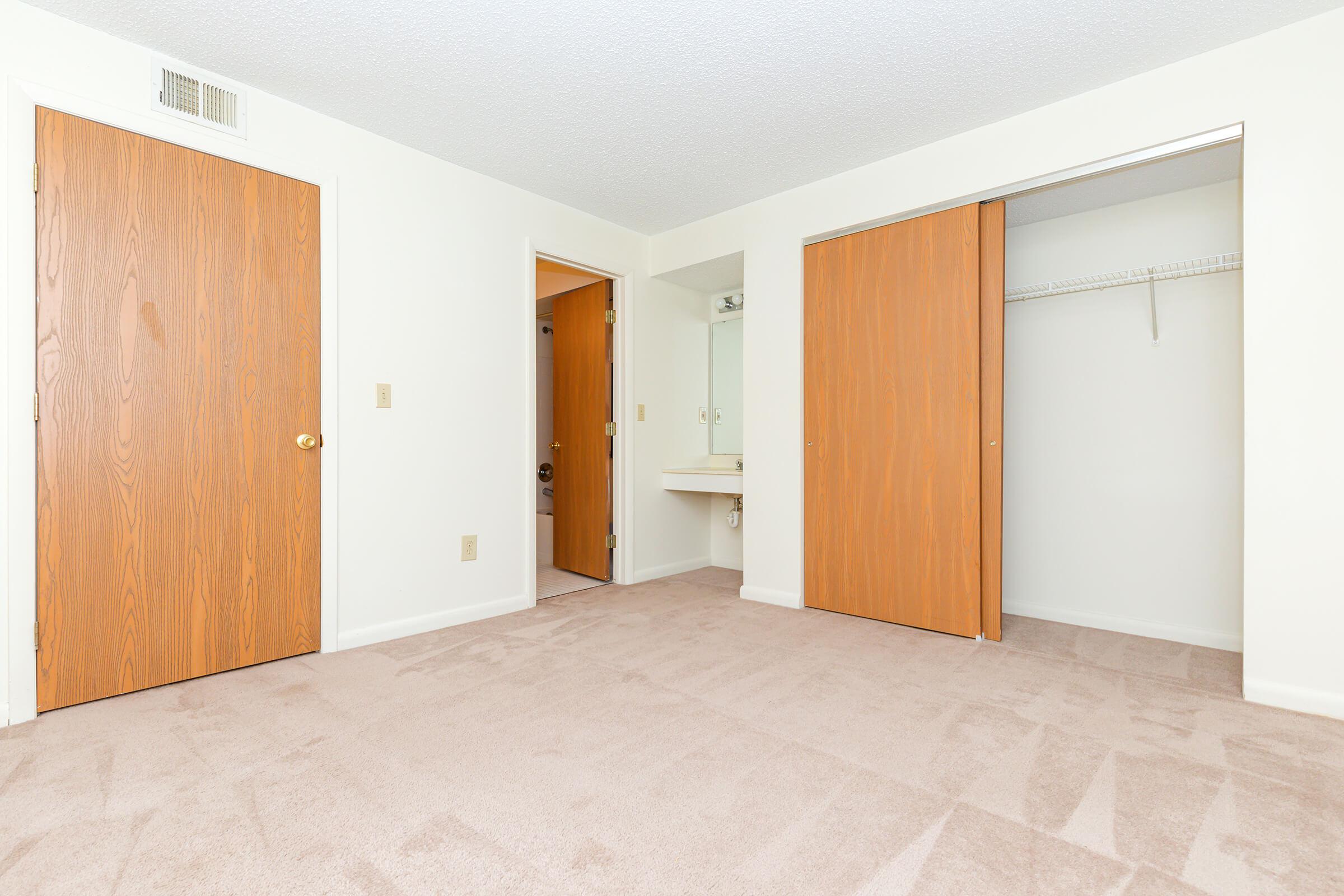 a kitchen with a wooden floor