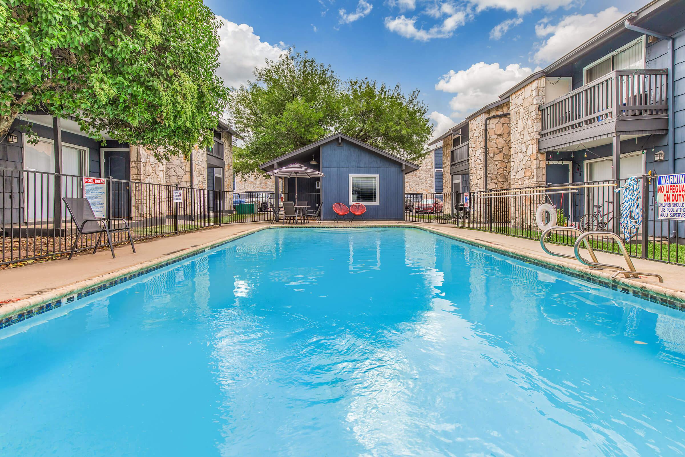 a house with a large pool of water