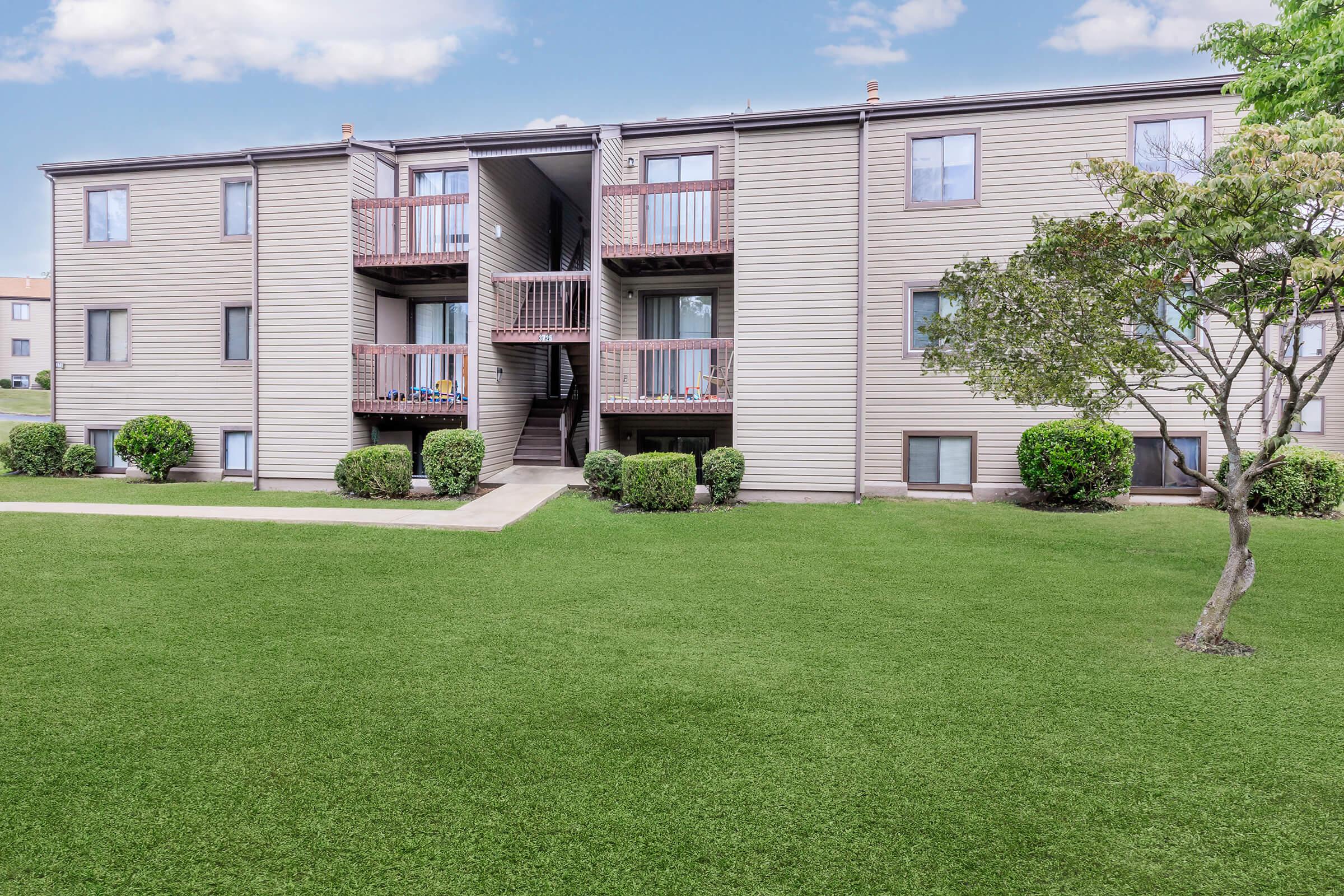 a large lawn in front of a house