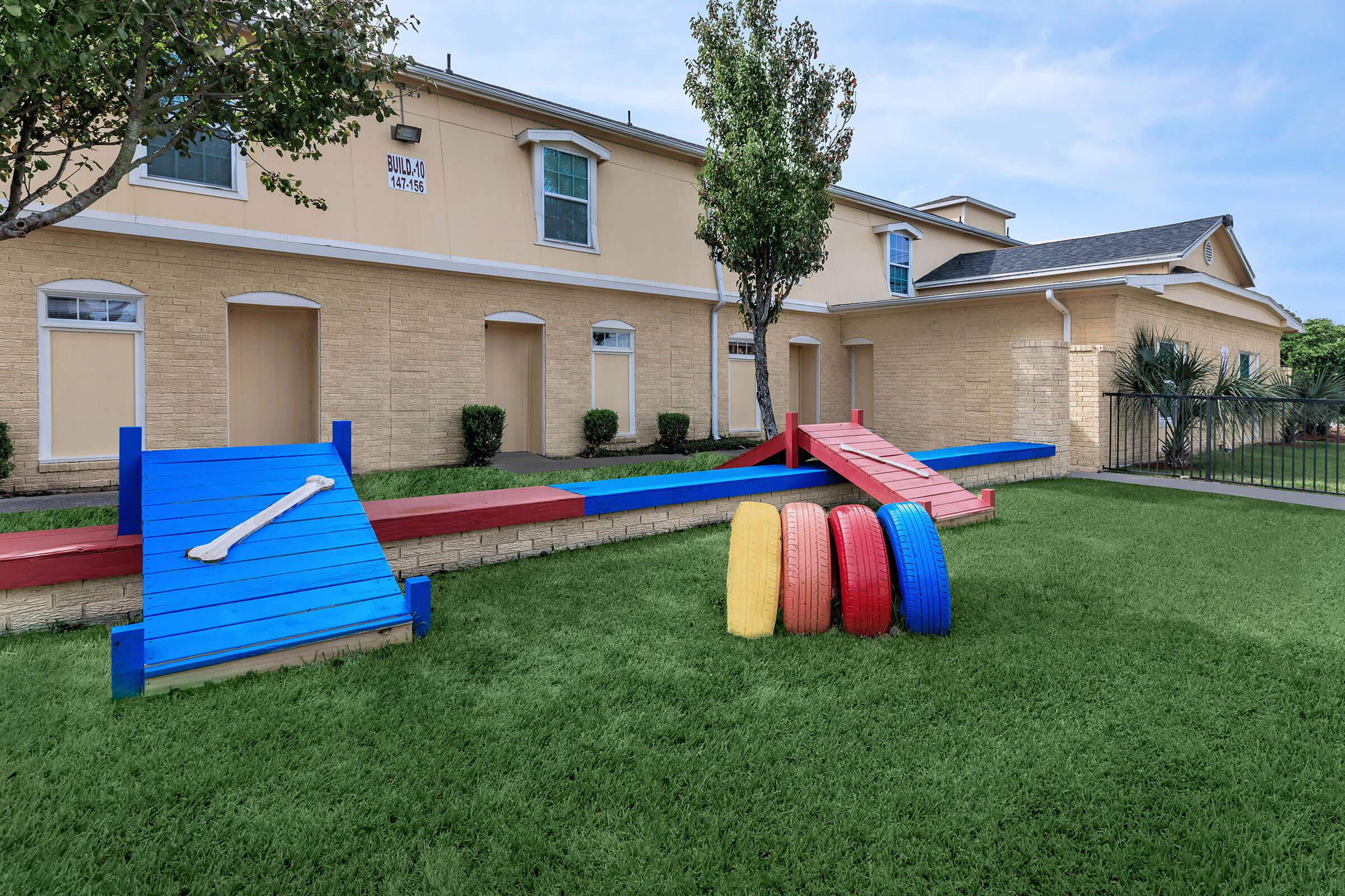 a large lawn in front of a house