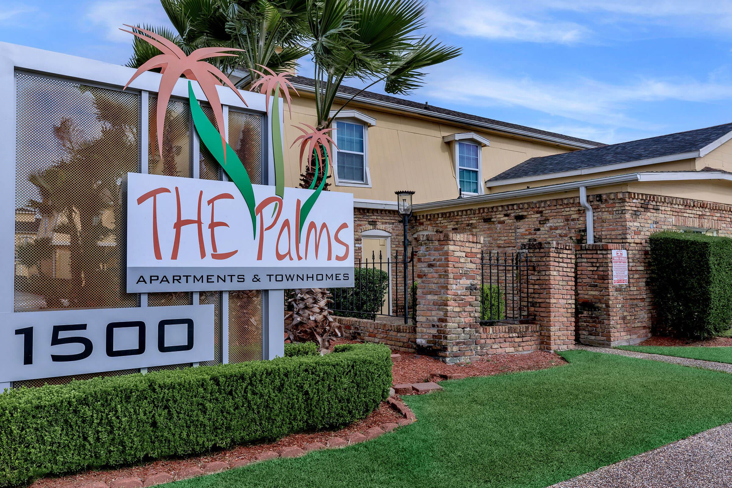 a house that has a sign on the side of a building