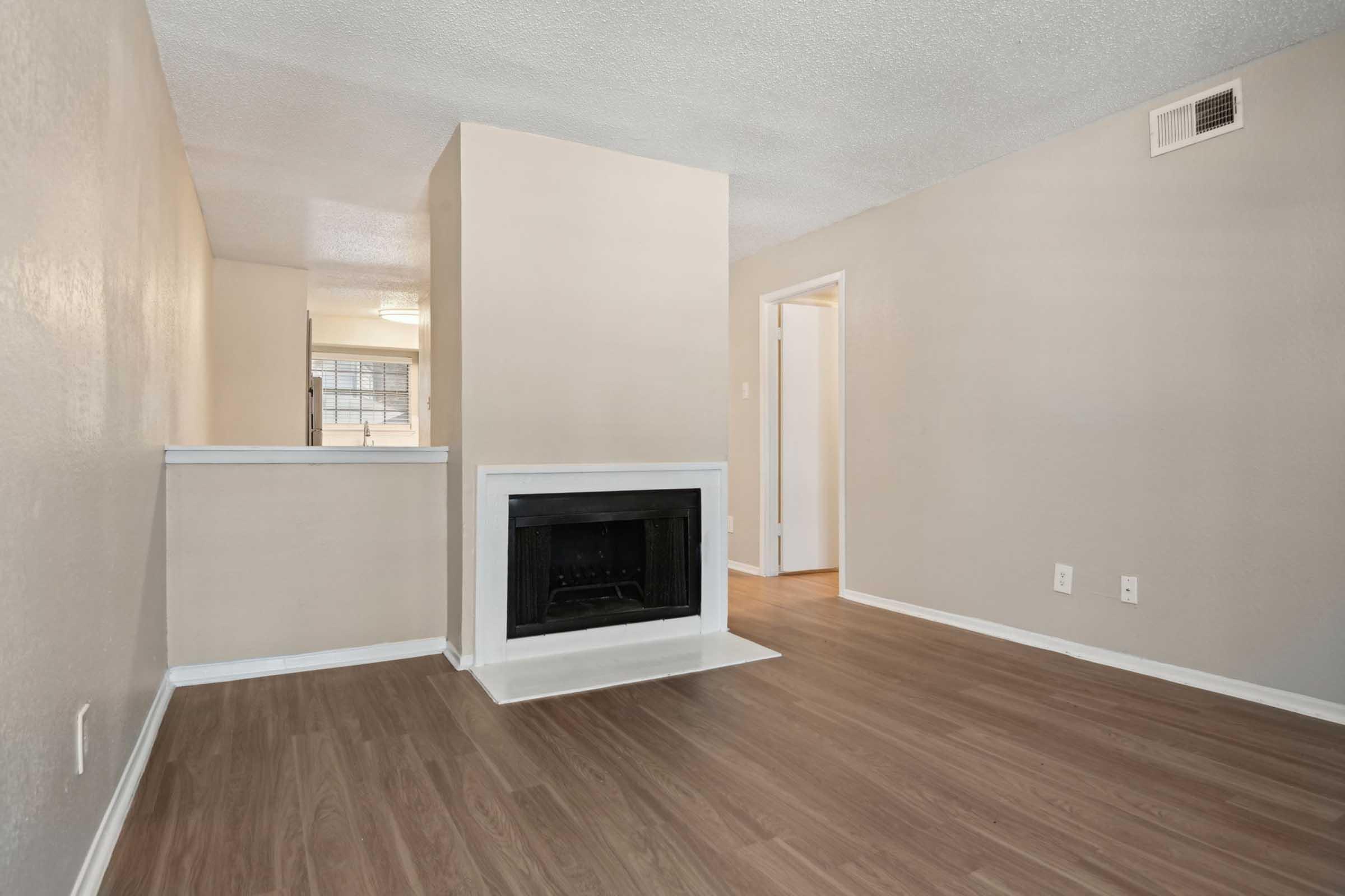 a kitchen with a wood floor