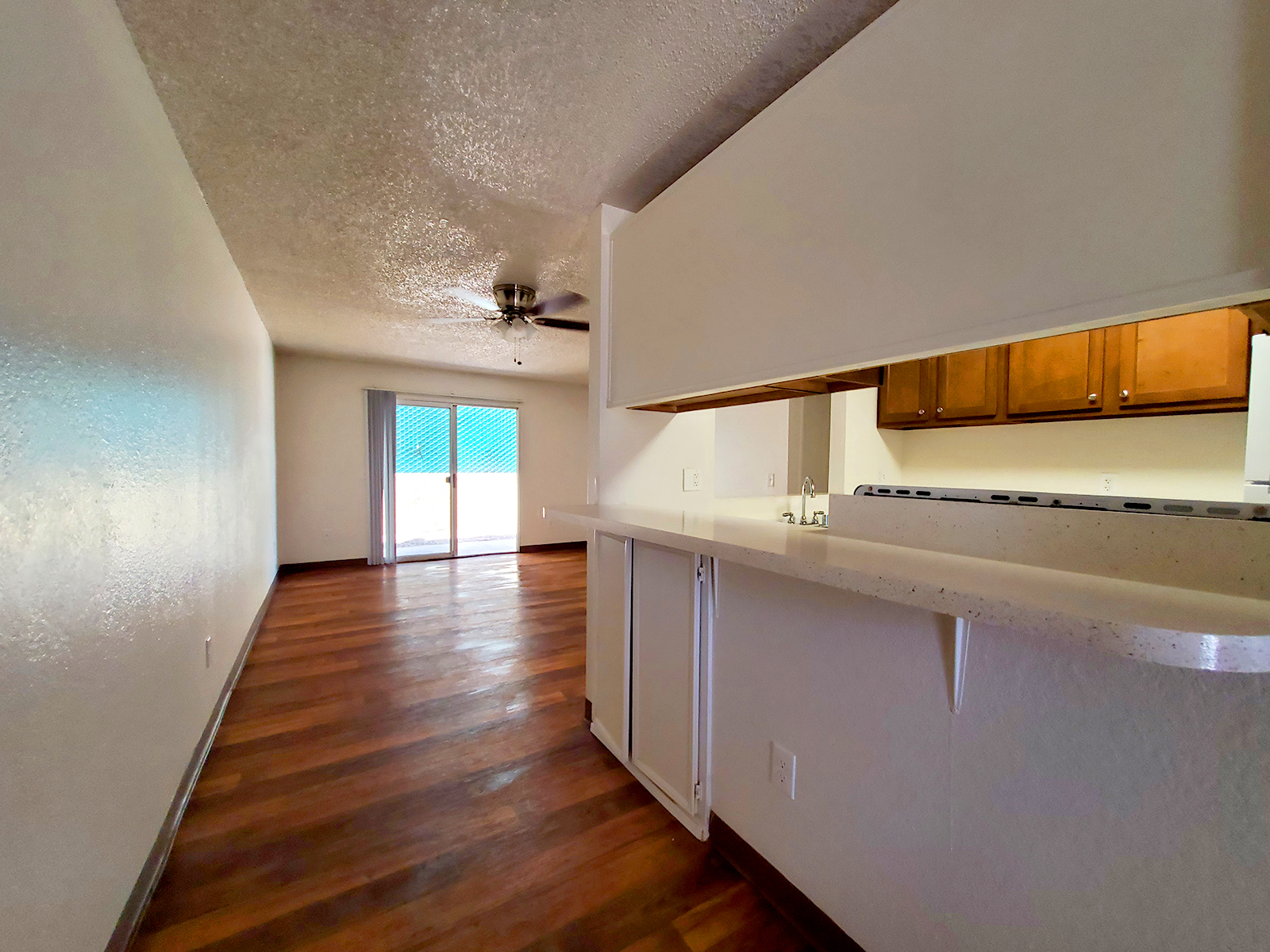 a kitchen with a wood floor